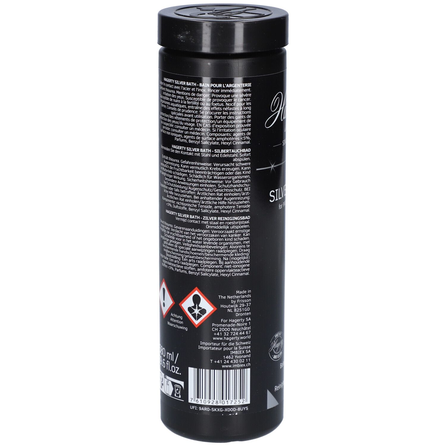 Dos du flacon noir. Texte multilingue, avertissements et symboles de danger. Informations du fabricant.