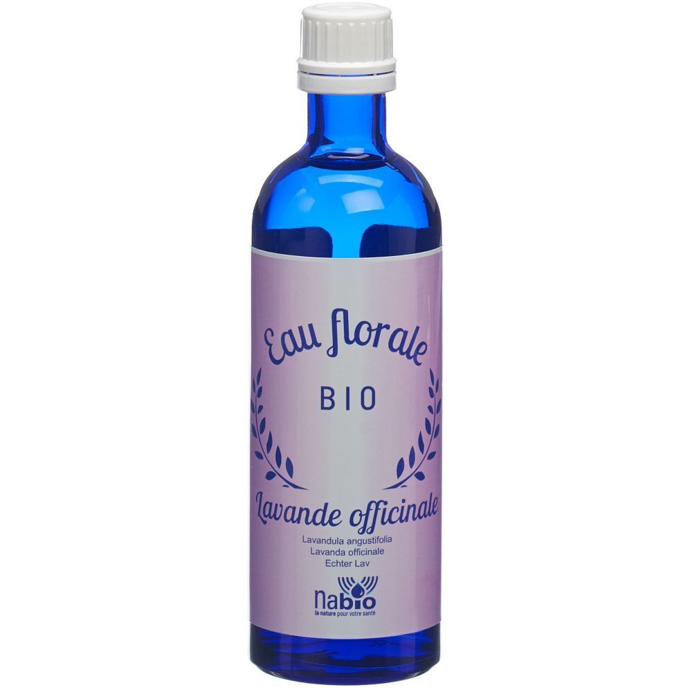 Flacon en verre bleu avec bouchon blanc. Étiquette: Eau florale BIO, Lavande officinale, Nabio.