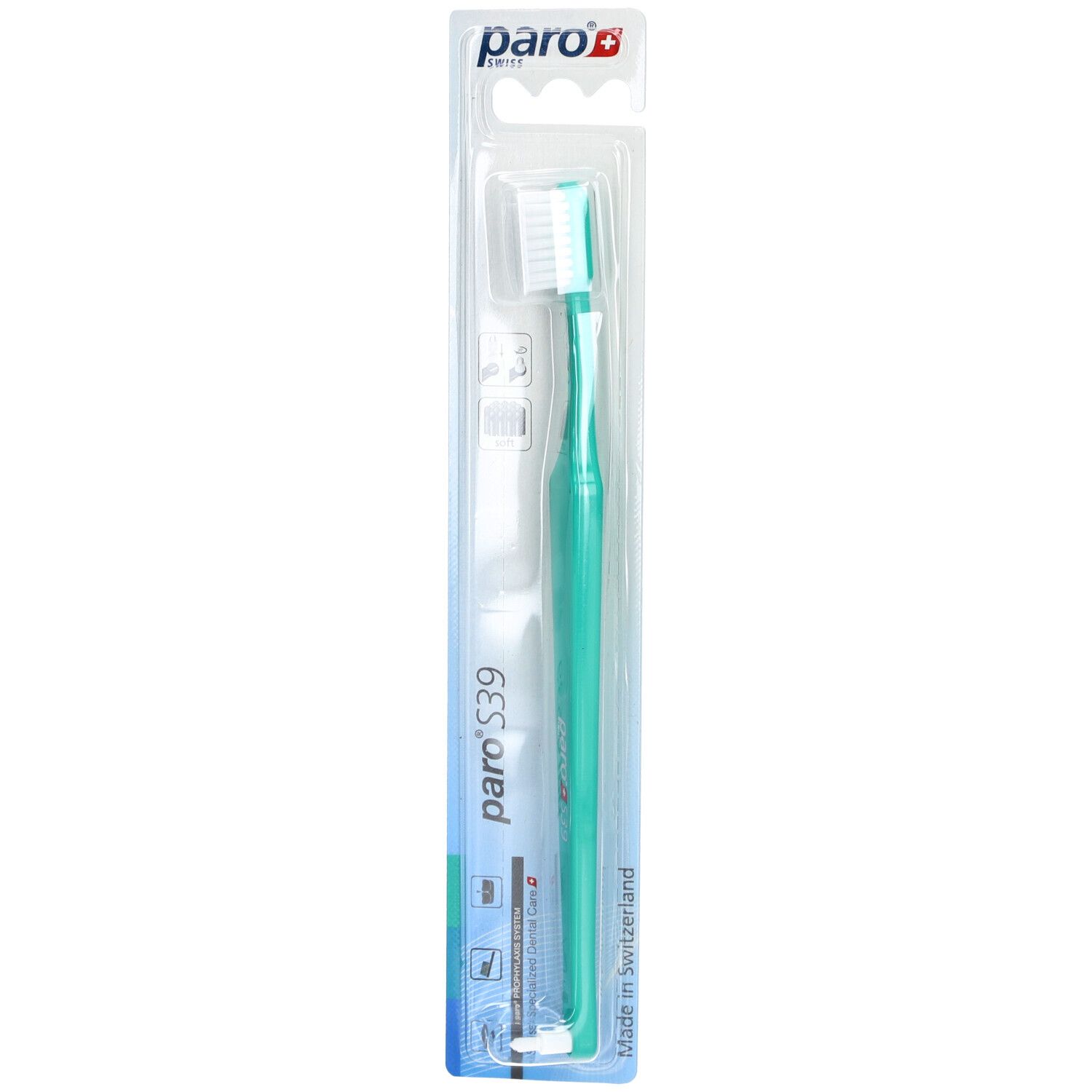 Brosse à dents verte et blanche dans son emballage. Marque : paro.