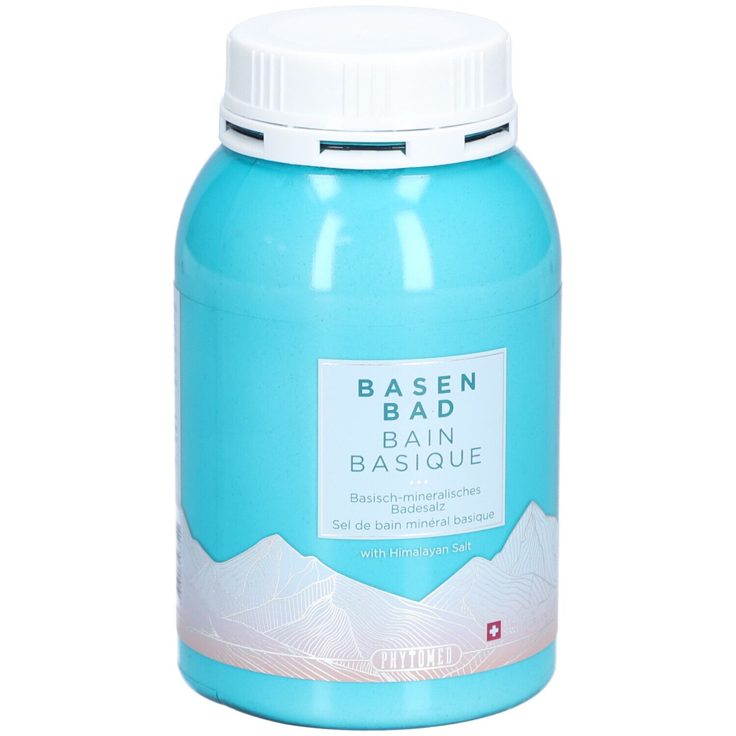 Boîte turquoise avec couvercle blanc. Inscription: BASEN BAD, BAIN BASIQUE. Croix suisse. Motif montagne. Avec sel de l'Himalaya.