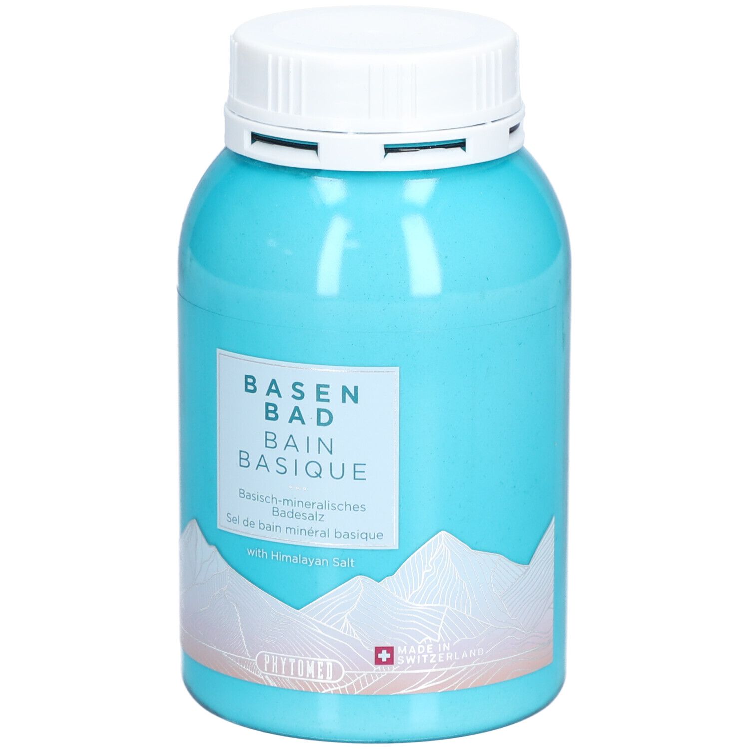 Boîte turquoise avec couvercle blanc. Inscription: BASEN BAD, BAIN BASIQUE. Croix suisse. Motif montagne. Avec sel de l'Himalaya.