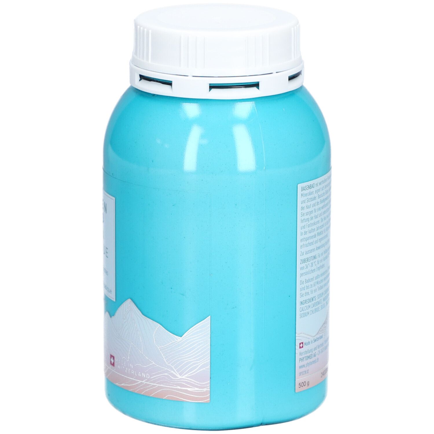 Boîte turquoise avec couvercle blanc. Texte au dos. Motif montagne. Croix suisse. 500 g.