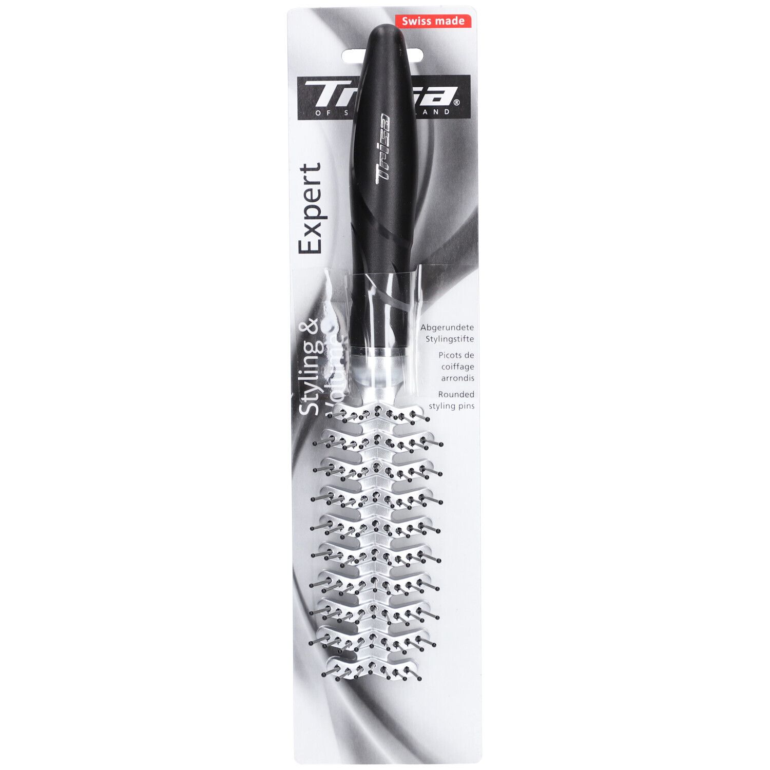 Brosse à cheveux ronde avec manche noir et picots argentés. Emballée dans un film transparent avec nom du produit.