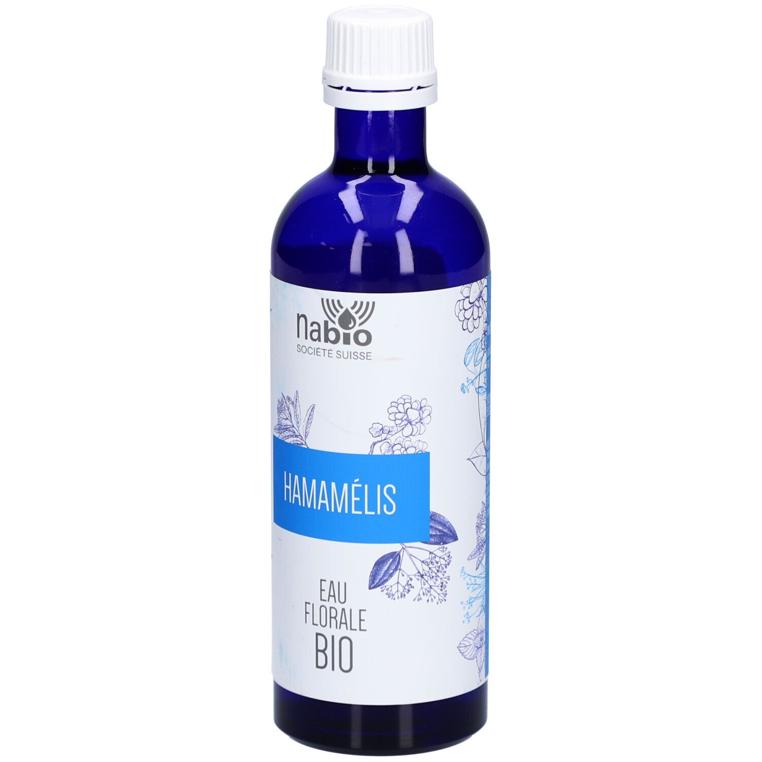 Flacon en verre bleu avec bouchon blanc. Inscription: HAMAMÉLIS, EAU FLORALE BIO. Logo NABIO SOCIETE SUISSE.