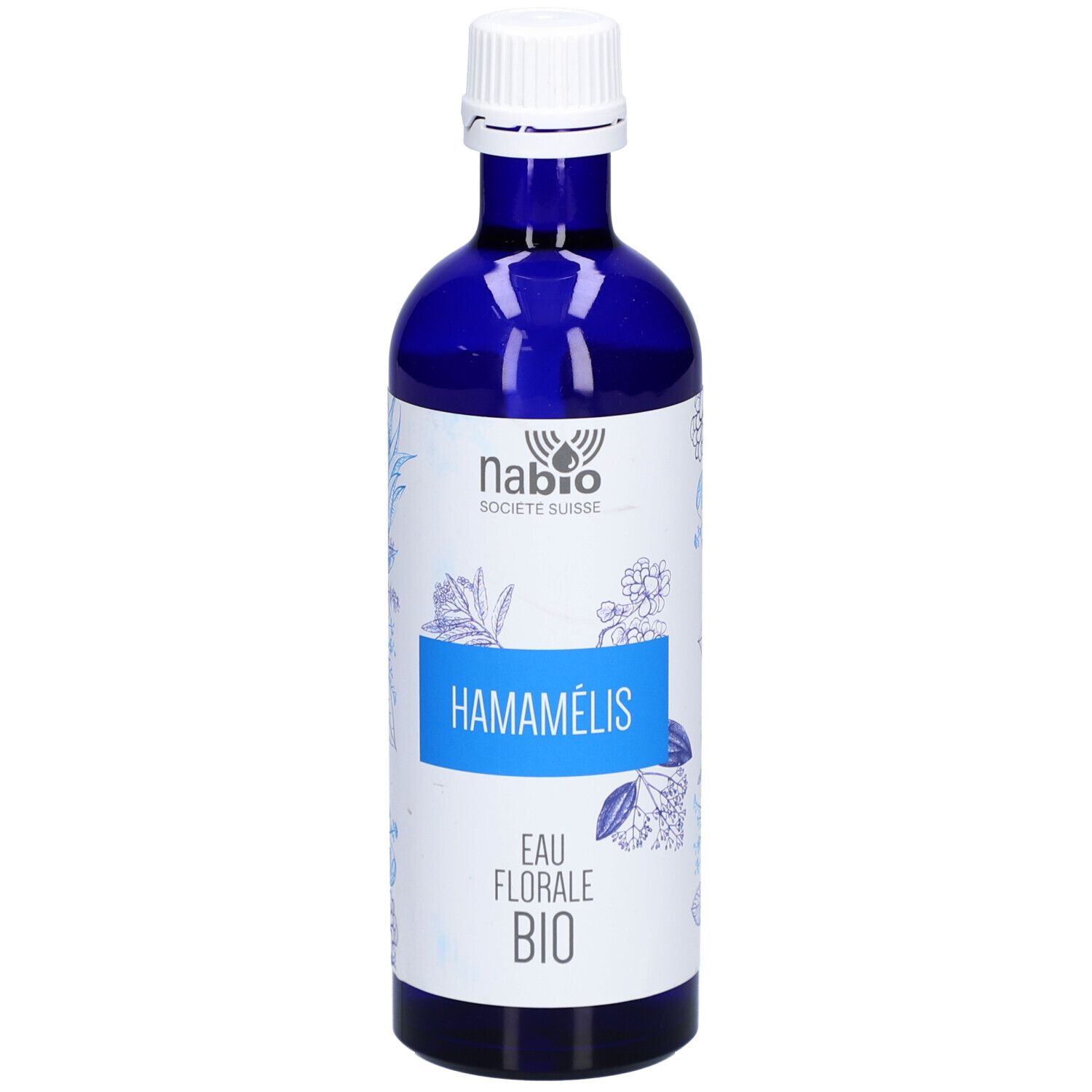 Flacon en verre bleu avec bouchon blanc. Inscription: HAMAMÉLIS, EAU FLORALE BIO. Logo NABIO SOCIETE SUISSE.