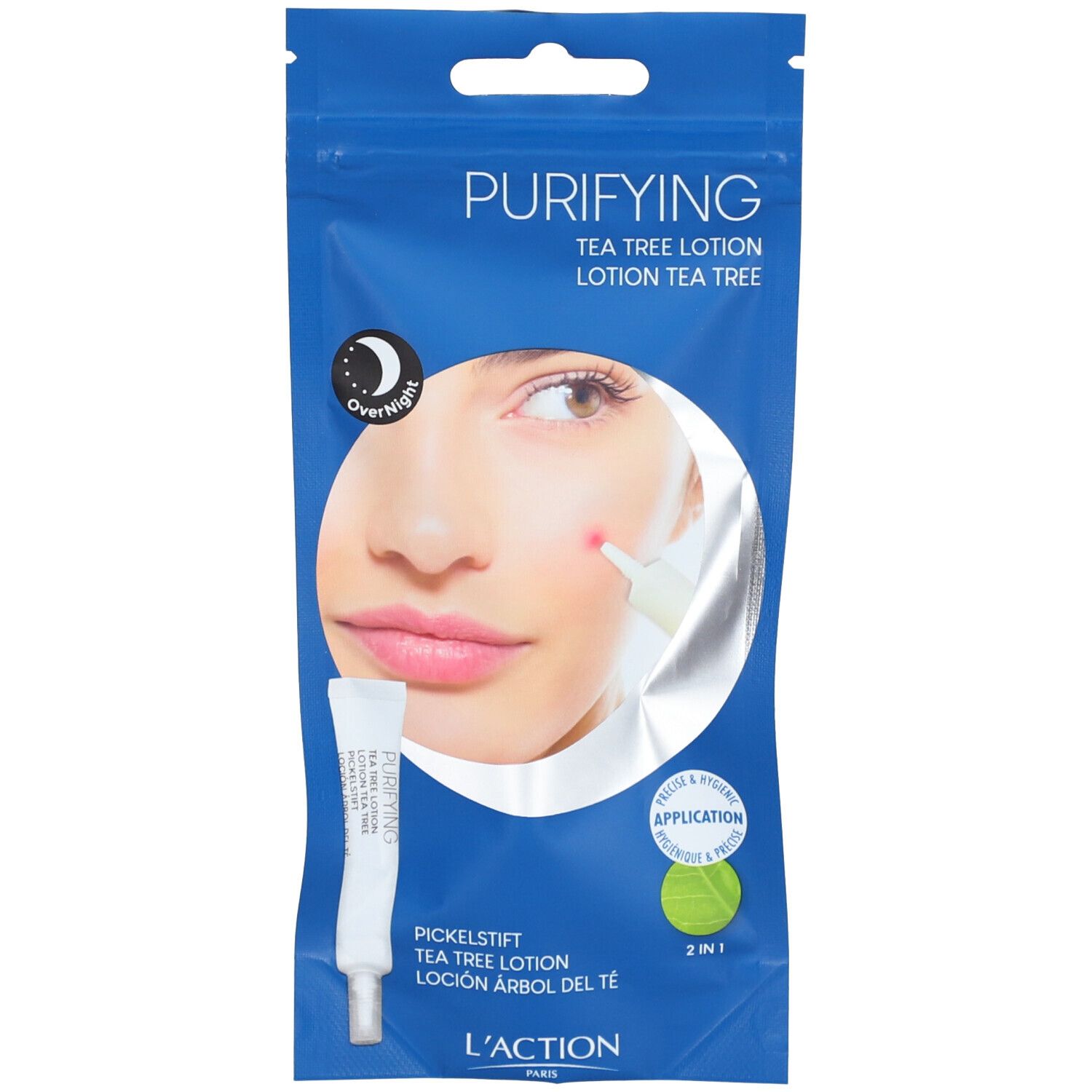 Sachet bleu. Produit: lotion Tea Tree. Texte: "Purifying", "2 in 1", "Overnight".