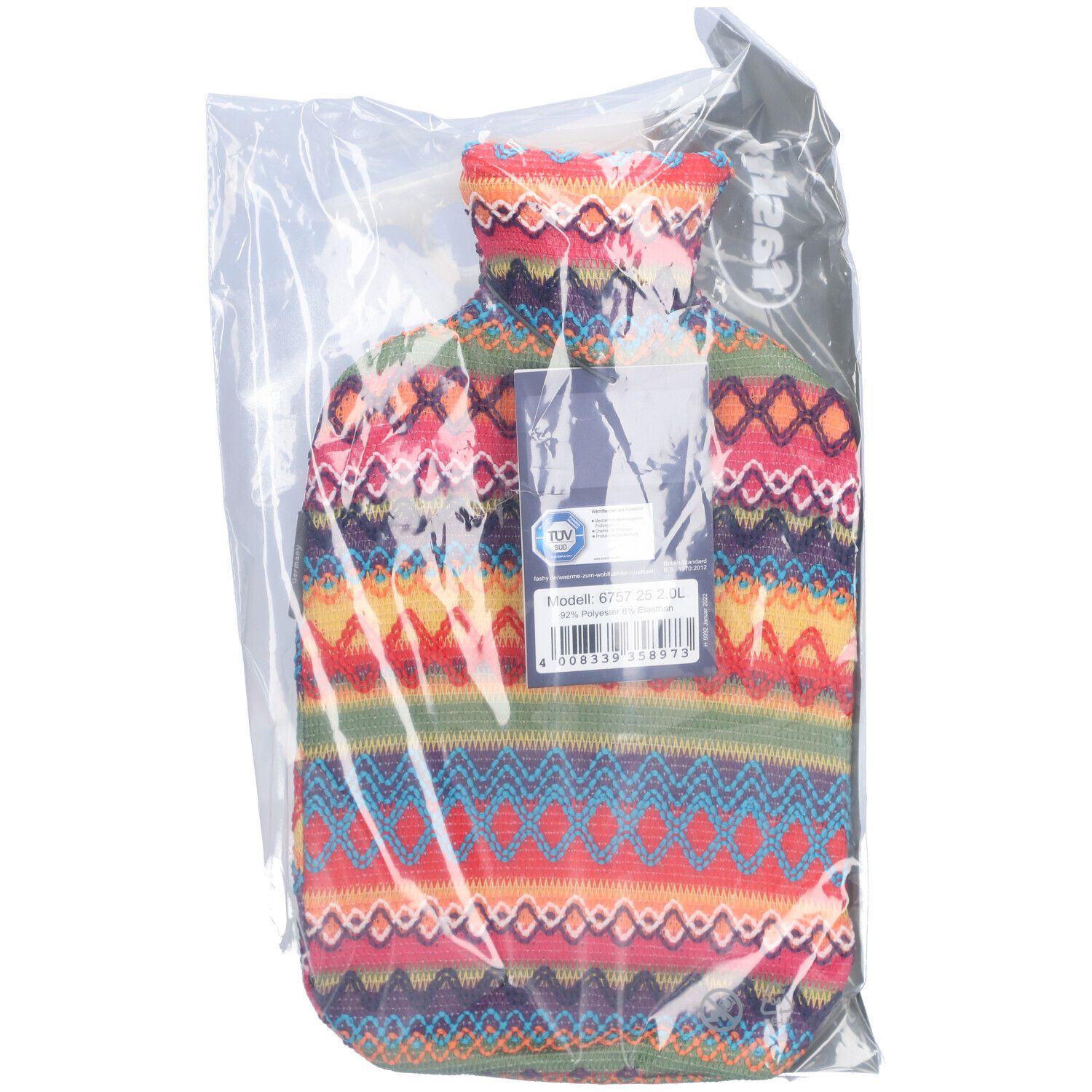 Bouillotte en tricot coloré, emballée dans un film transparent. Avec étiquette.