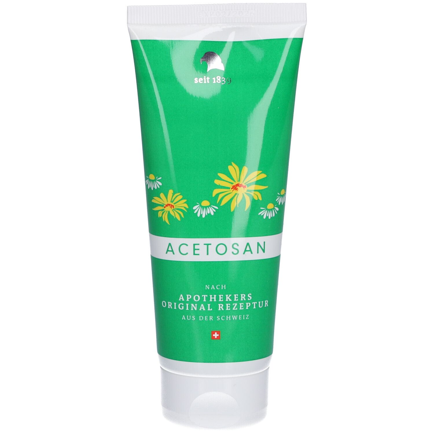 Tube verte avec bouchon blanc. Inscription: Acetosan, camomille et arnica. Croix suisse.