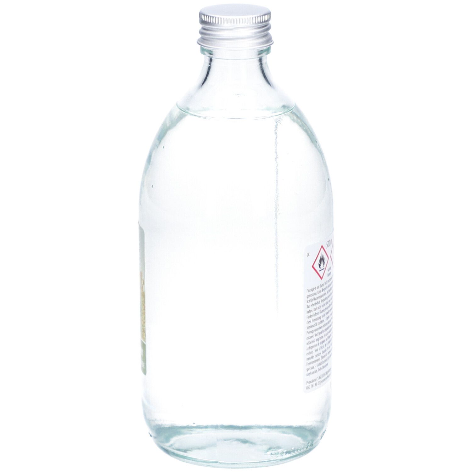 Flacon en verre avec bouchon argenté. Étiquette partiellement visible. Avertissements.