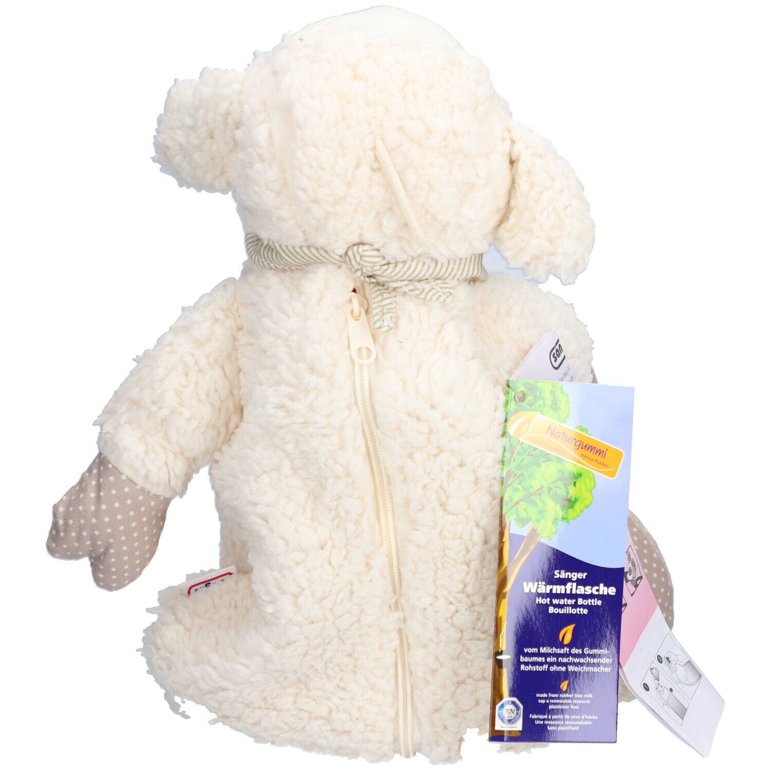 Mouton en peluche vu de dos avec fermeture éclair. Brochure jointe avec infos produit.
