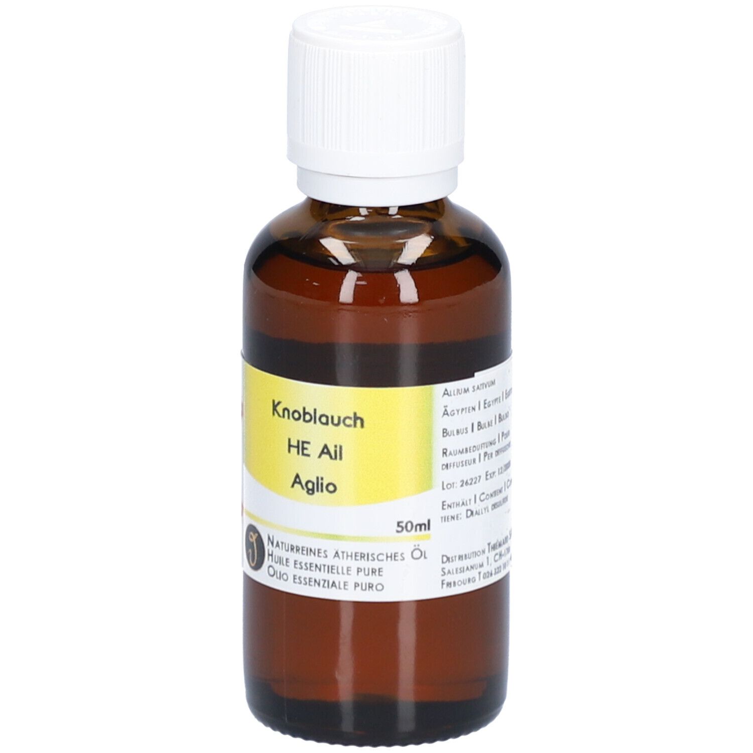 Flacon en verre brun avec bouchon blanc. Étiquette avec nom du produit et texte.