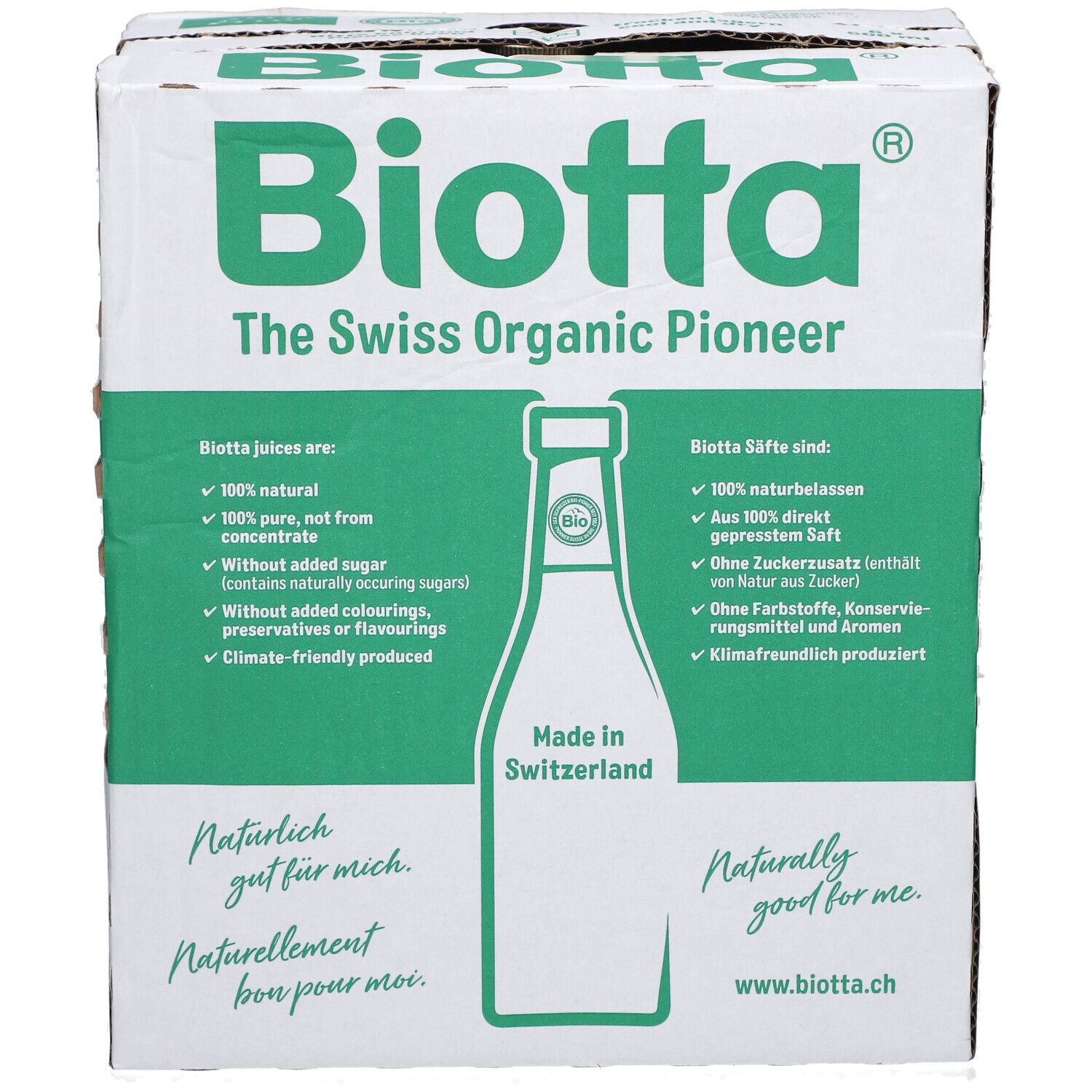 Carton BIOTTA avec éléments verts et blancs. Texte: The Swiss Organic Pioneer, Made in Switzerland. Contient 6 bouteilles.