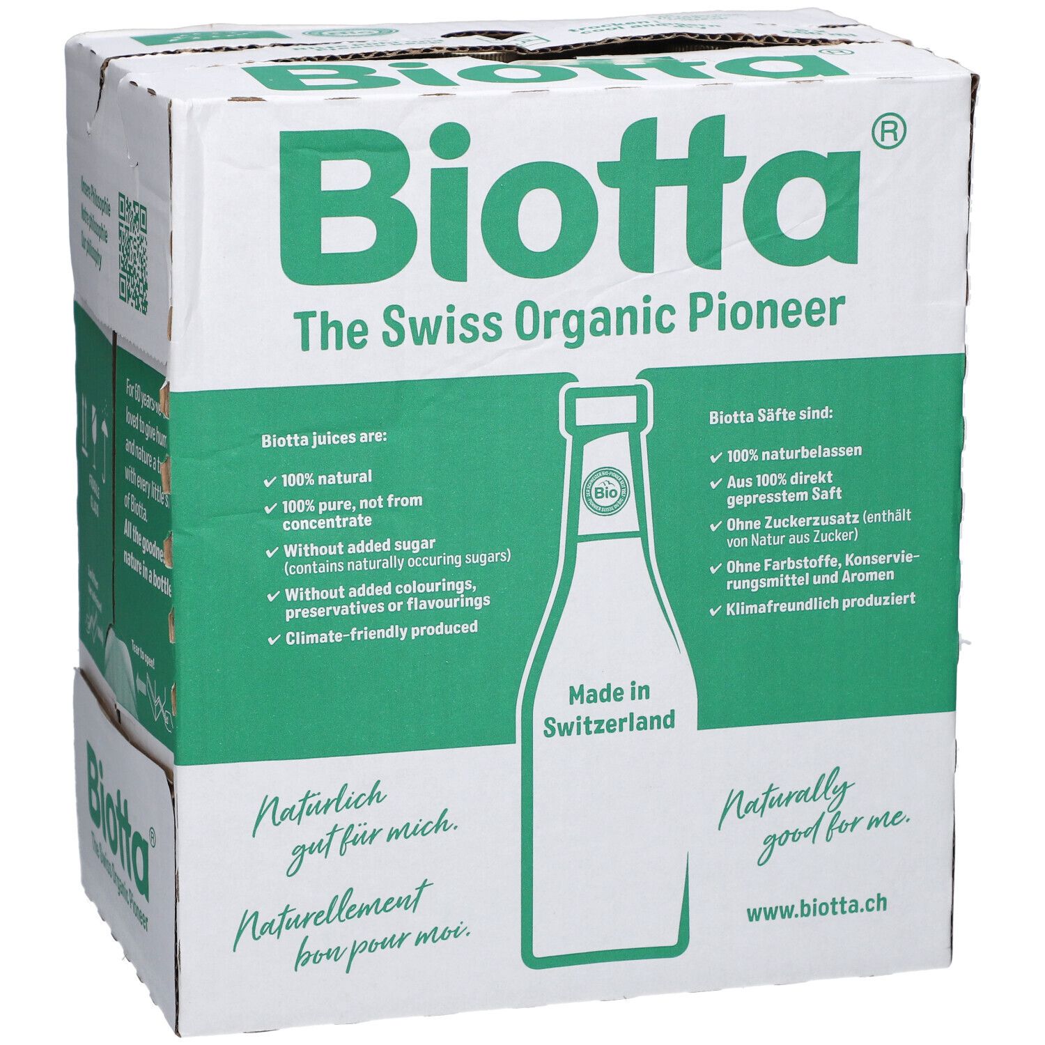 Carton BIOTTA avec éléments verts et blancs. Texte: The Swiss Organic Pioneer, Made in Switzerland. Contient 6 bouteilles.