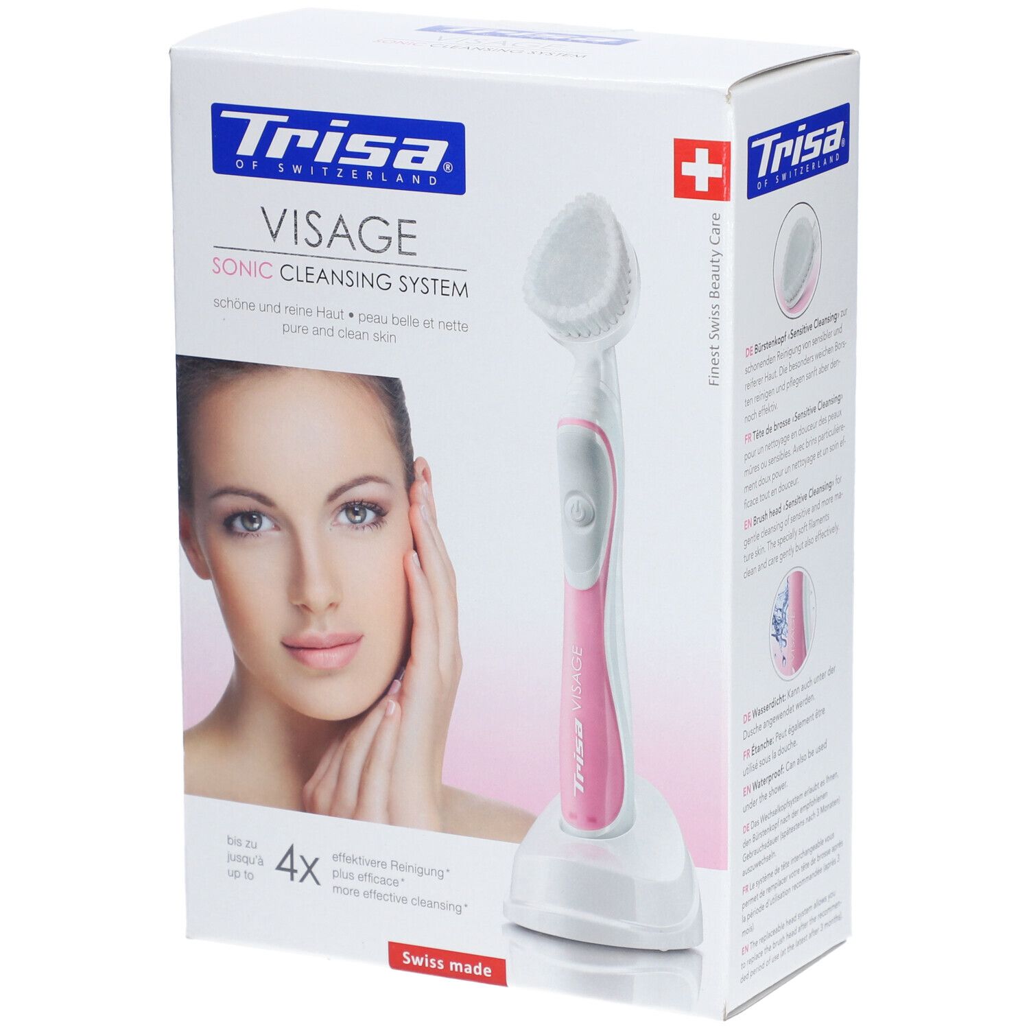 Emballage produit avec brosse visage et station de charge. La brosse est blanche et rose. Une femme est représentée sur l'emballage.