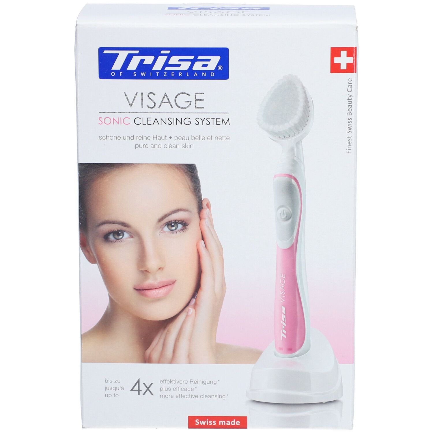 Emballage produit avec brosse visage et station de charge. La brosse est blanche et rose. Une femme est représentée sur l'emballage.