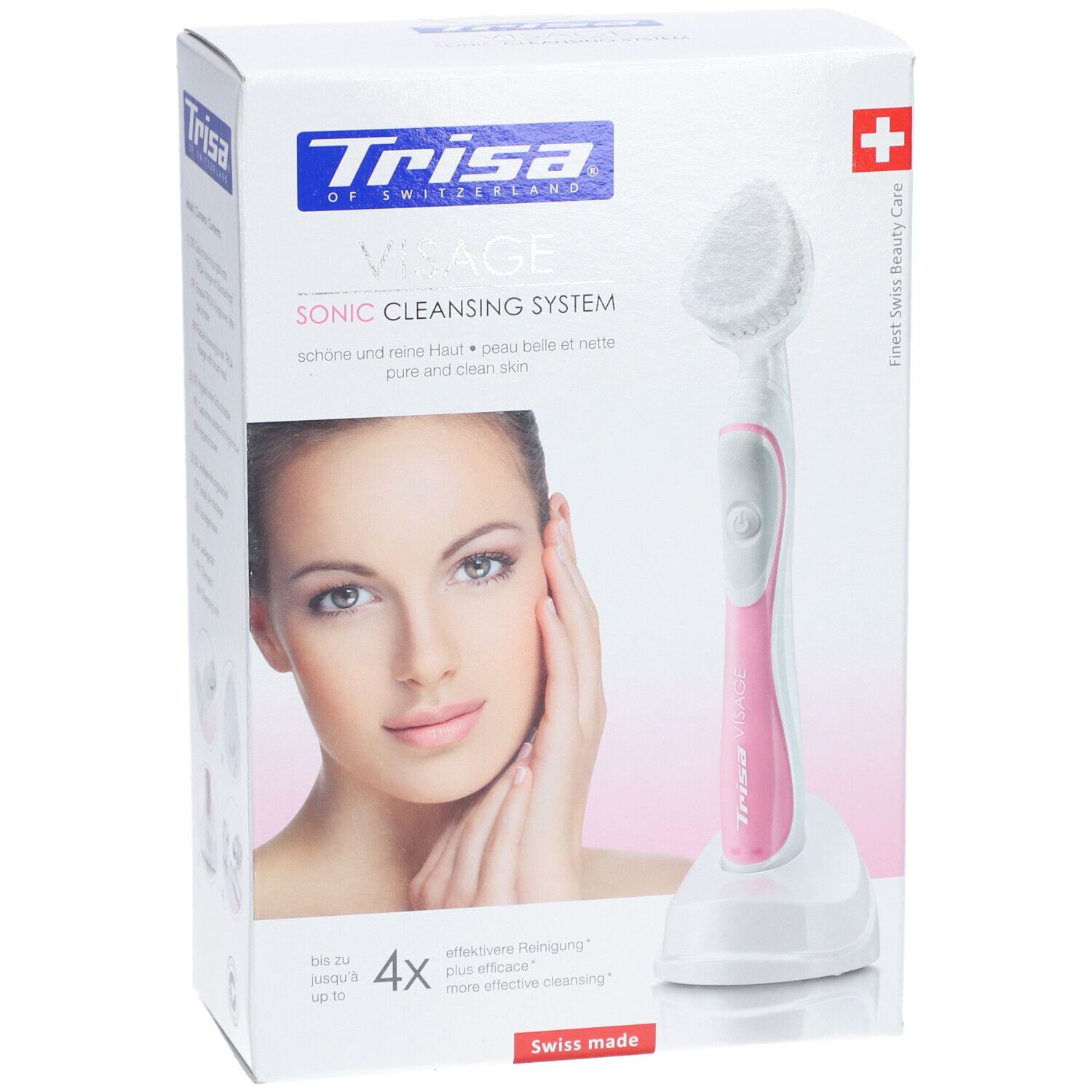 Emballage produit avec brosse visage et station de charge. La brosse est blanche et rose. Une femme est représentée sur l'emballage.