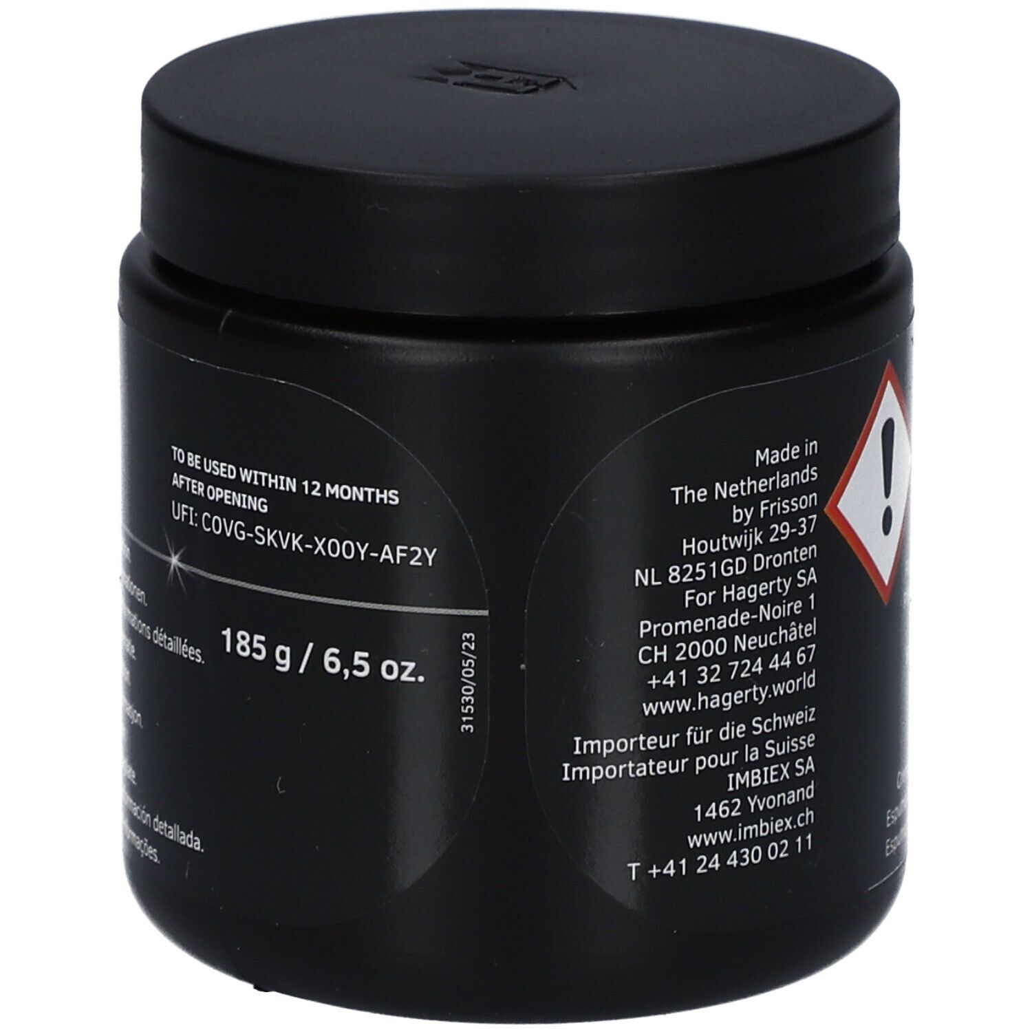 Pot noir avec couvercle. Inscription Hagerty. Poids 185 g / 6,5 oz. Code UFI. Date de péremption.