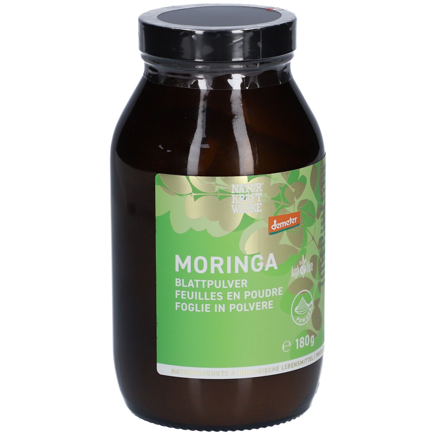 Flacon en verre brun avec couvercle noir. Étiquette verte avec motif de feuilles et texte: Moringa, feuilles en poudre, Demeter, 180g.