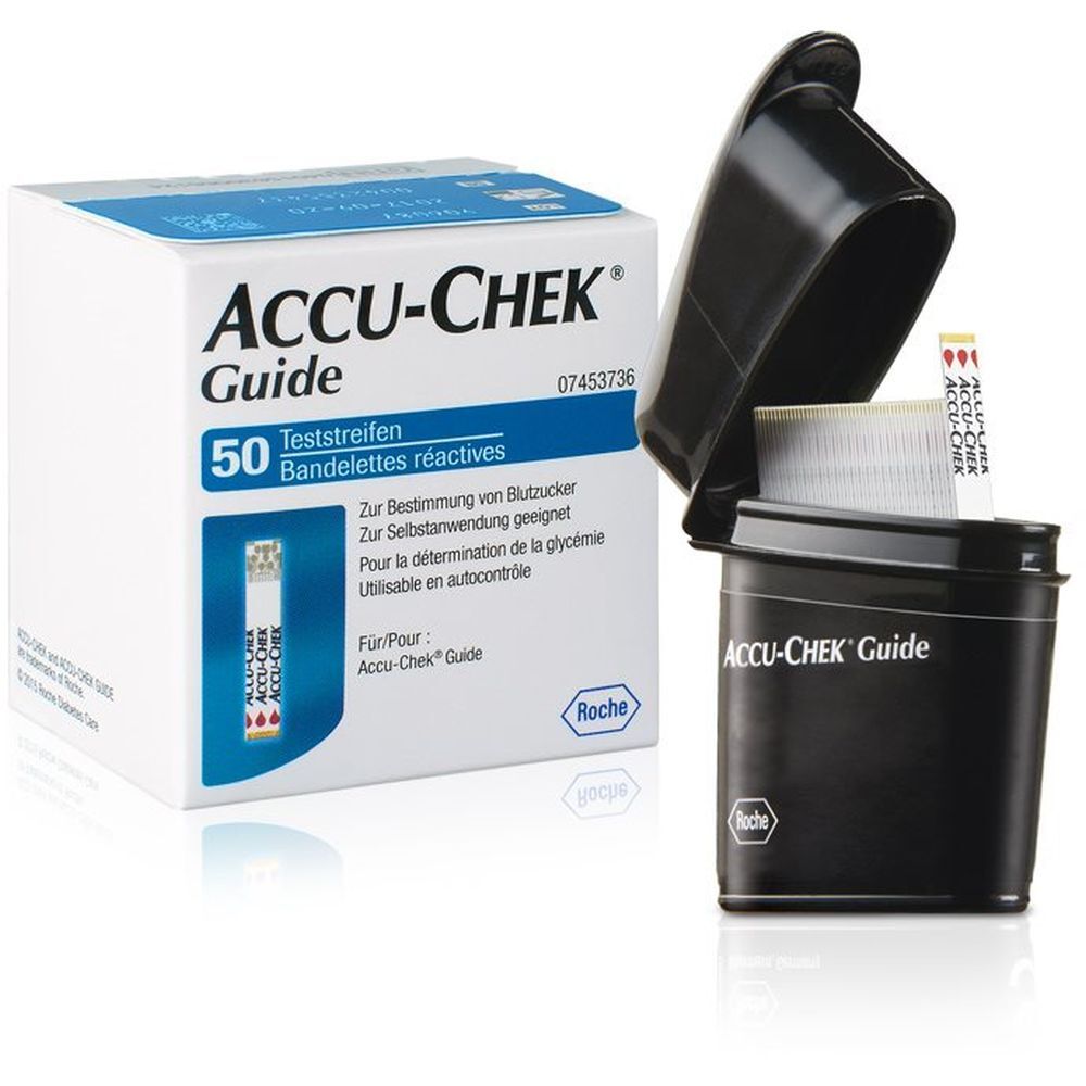 Boîte ouverte de bandelettes réactives ACCU-CHEK Guide. Support noir avec bandelettes. Bandelettes blanches visibles.