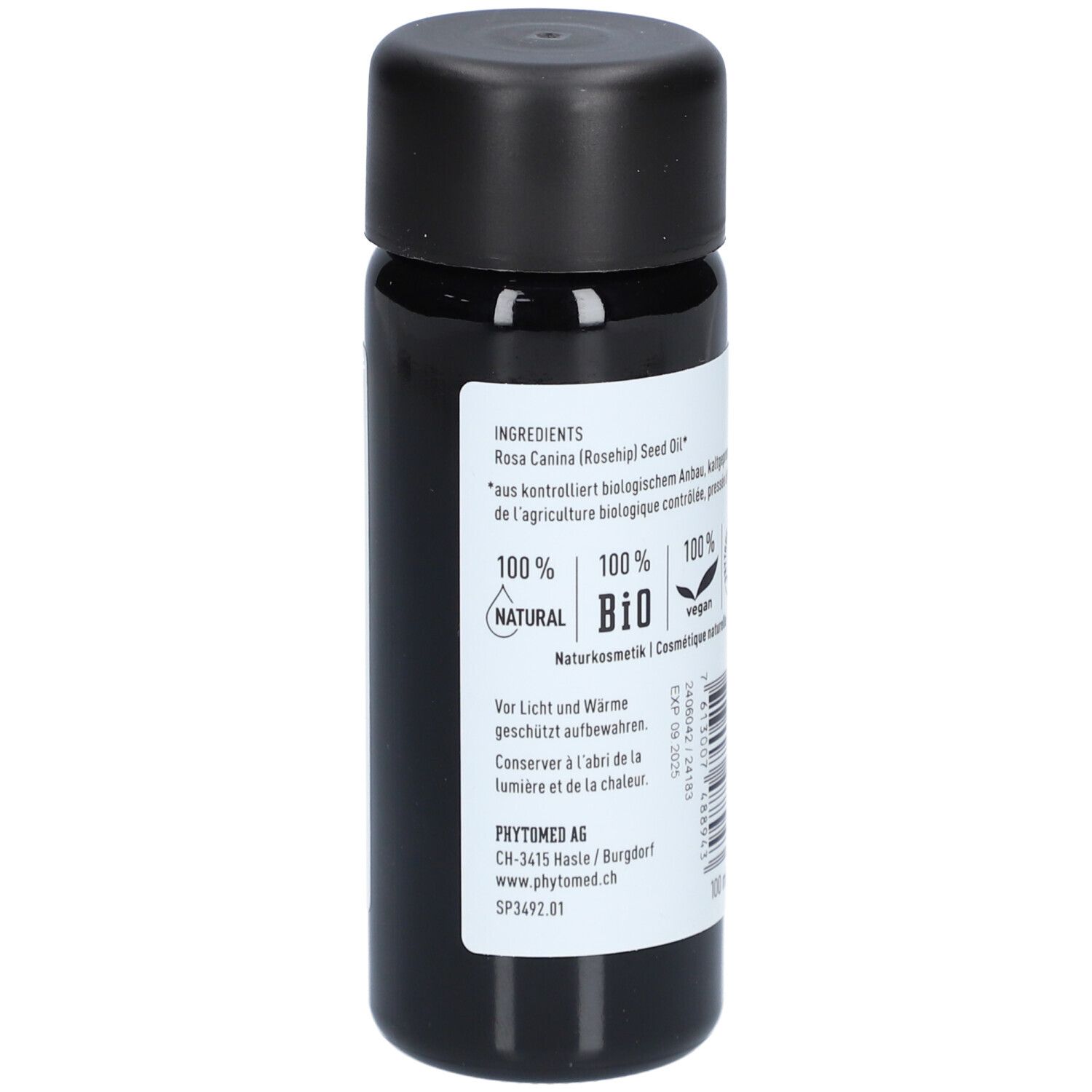 Vue latérale de la bouteille d'huile de rose musquée bio avec liste des ingrédients.