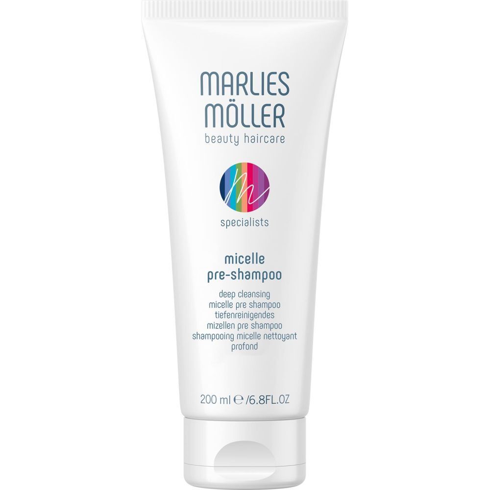 Tube blanche avec impression. Inscription: Marlies Möller beauty haircare, micelle pre-shampoo. Cercle coloré avec 'm'.