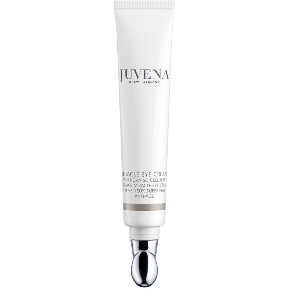 Tube blanche avec applicateur argenté. Inscription: JUVENA, Miracle Eye Cream. Anti-Âge.