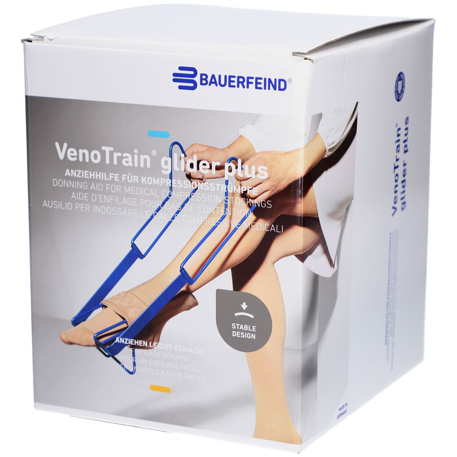 Boîte de l'aide à l'enfilage pour bas de compression. Aide bleue avec poignées et jambe dans bas. Marque et nom du produit visibles.