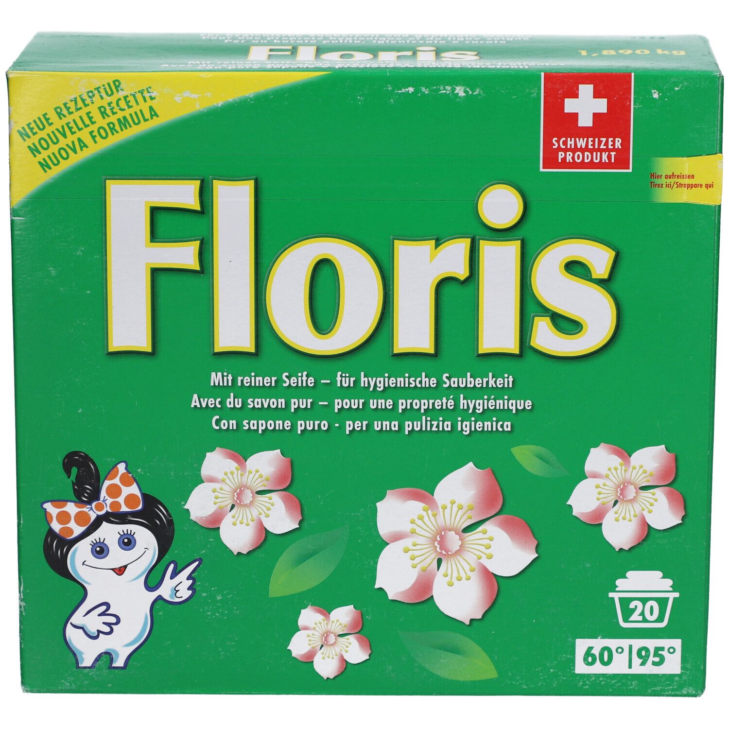 Boîte verte avec logo "Floris", fleurs et personnage de dessin animé. Texte en allemand, français, italien. 20 lavages.