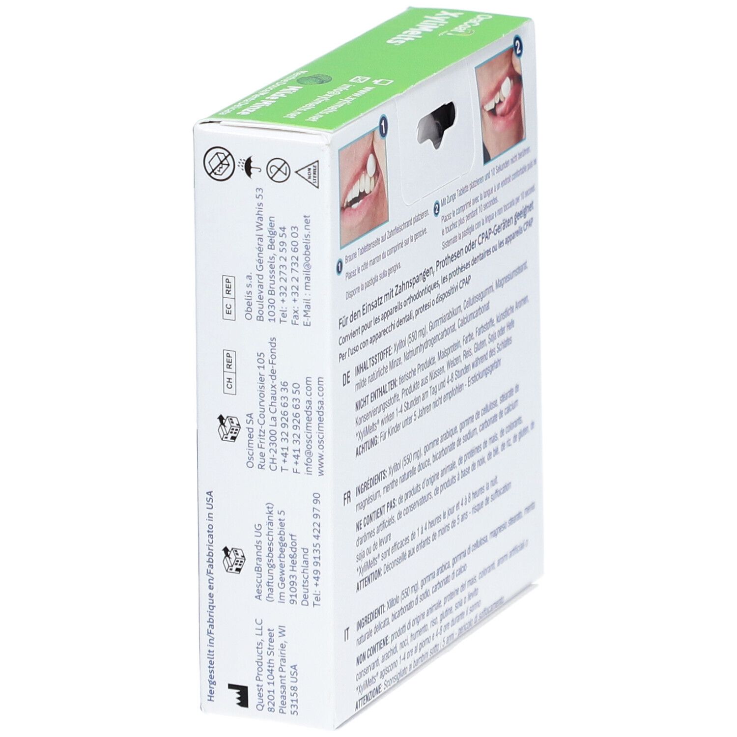 Boîte OraCoat XyliMelts®, en biais. Dos avec informations fabricant et adresses de contact. Texte en allemand et anglais.