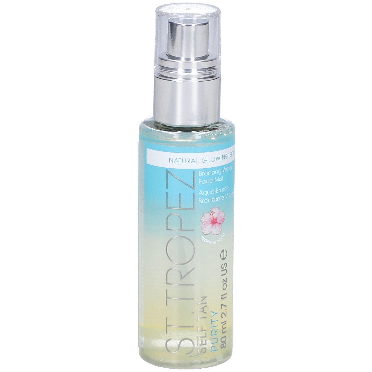 Flacon de brume transparente avec vaporisateur. Inscriptions: ST. TROPEZ, PURITY, SELF TAN. Étiquette avec nom du produit.