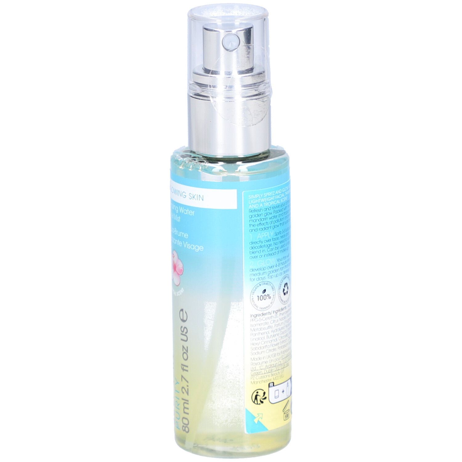 Dos du flacon. Étiquette avec informations produit. Inscription: ST. TROPEZ. Flacon avec vaporisateur.