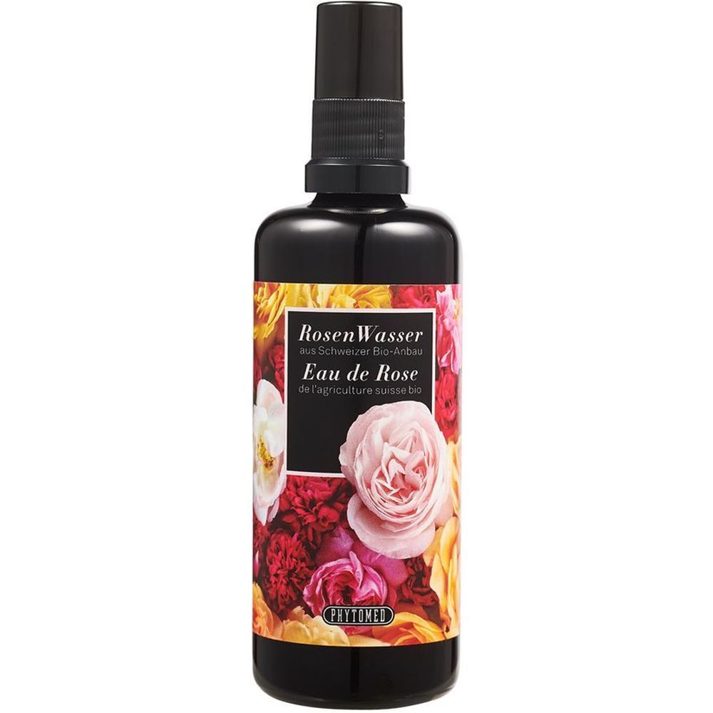 Flacon pulvérisateur noir avec étiquette florale. Inscription: RosenWasser, Eau de Rose. Marque: PHYTOMED.