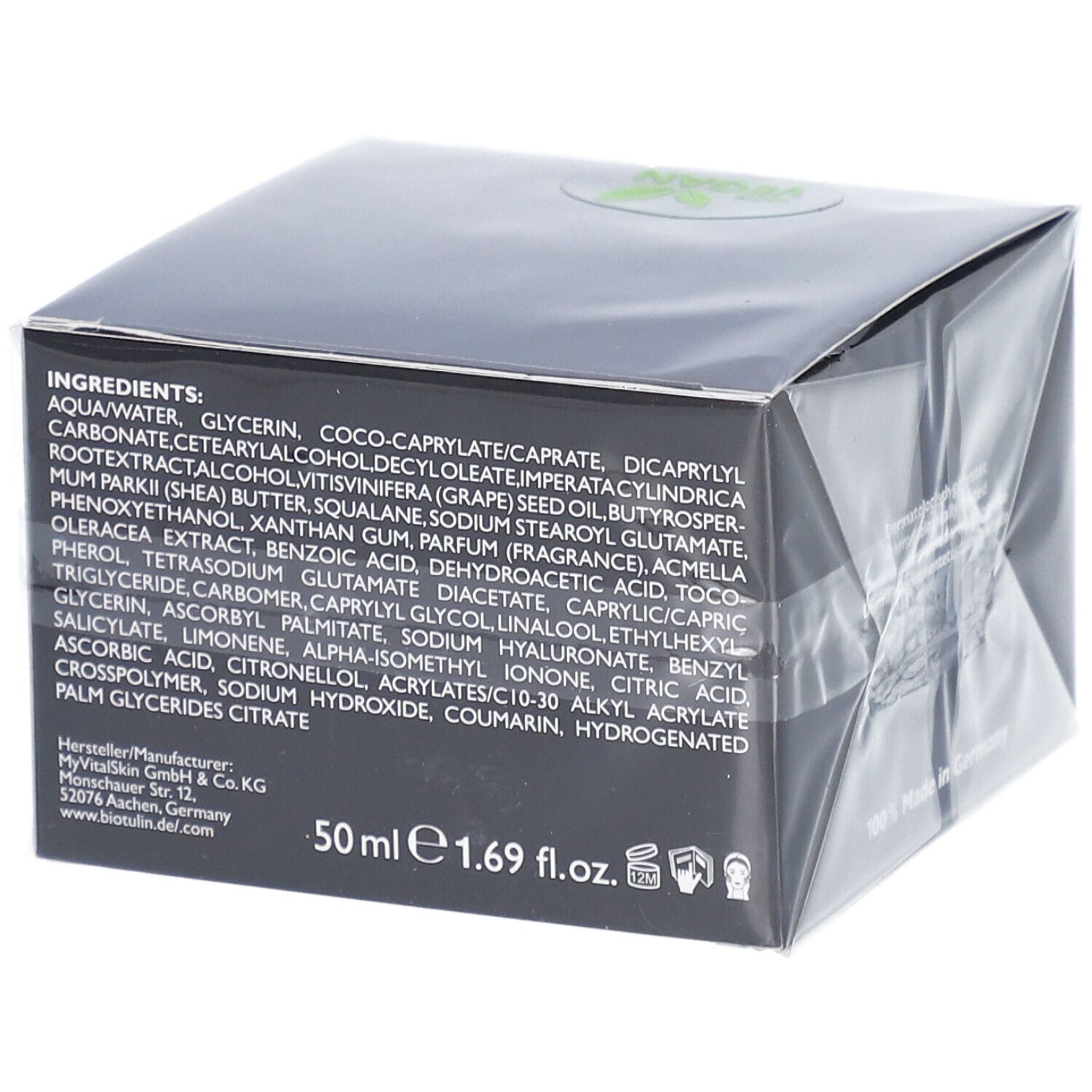 Boîte noire avec ingrédients et informations fabricant. 50 ml. Logo vegan.