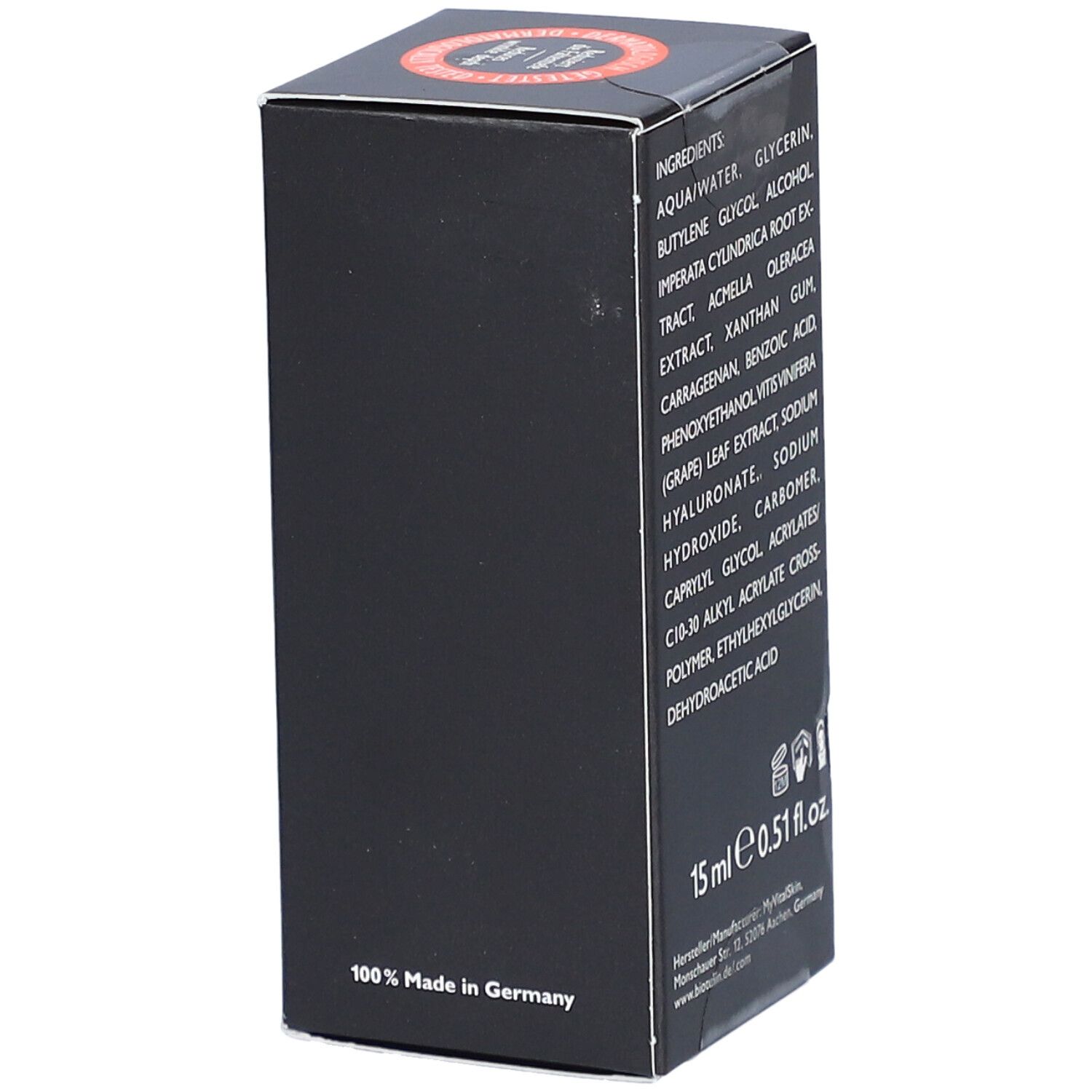 Boîte noire avec ingrédients, 15 ml, informations fabricant et label végétalien.