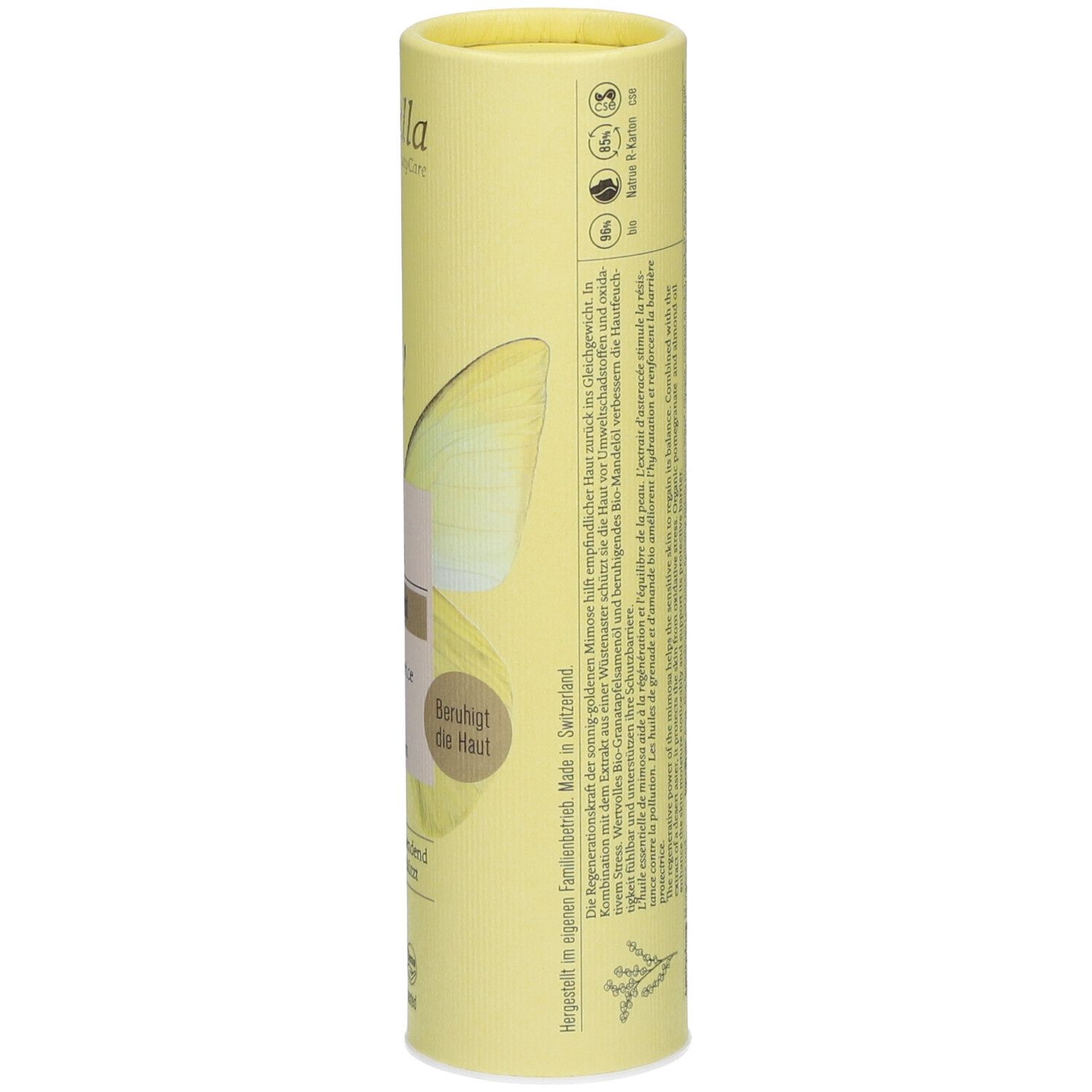 Emballage cylindrique jaune. Dos avec texte, ingrédients et logos. Fabriqué en Suisse.