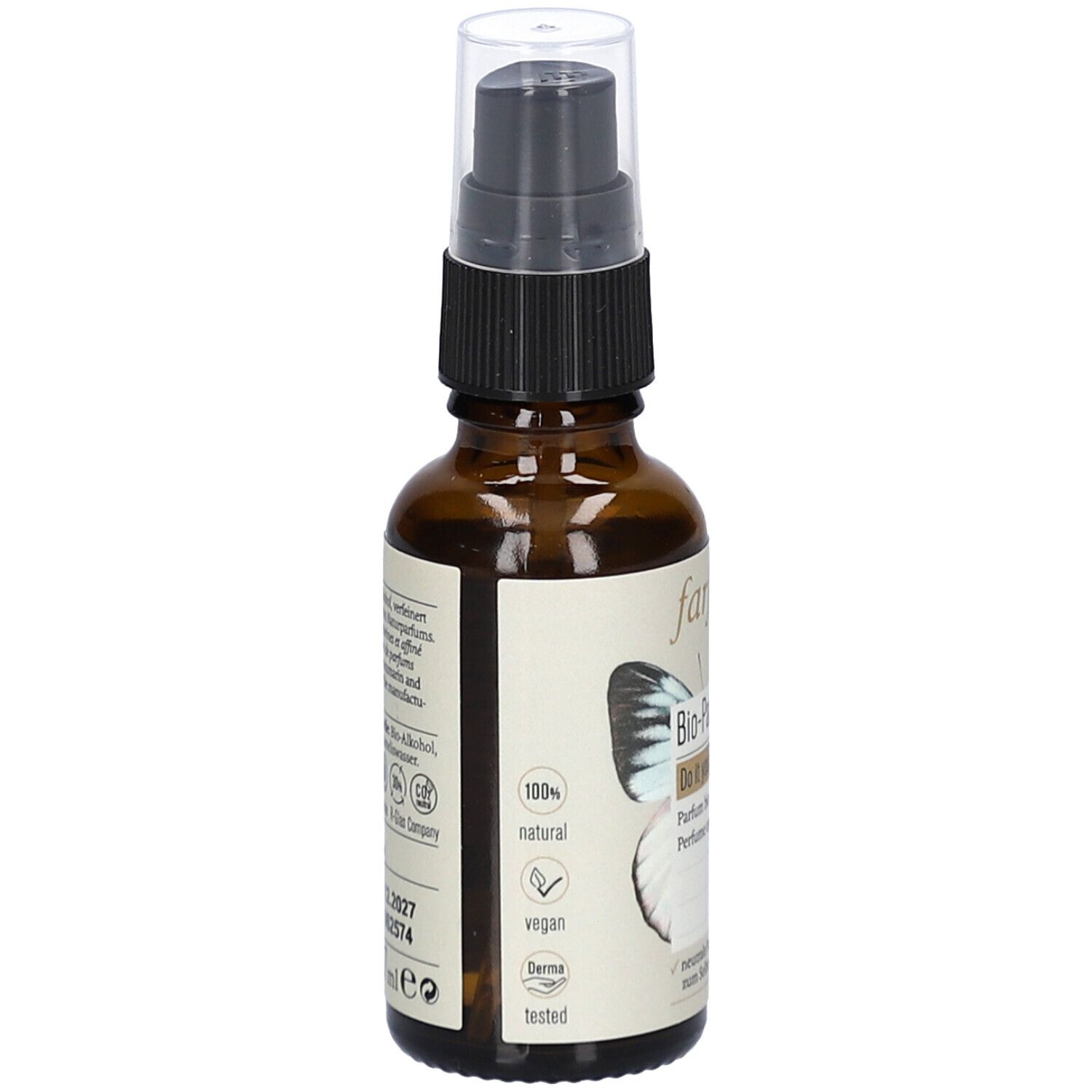 Flacon en verre brun avec vaporisateur. Étiquette avec logo, texte et informations sur les ingrédients et certifications.