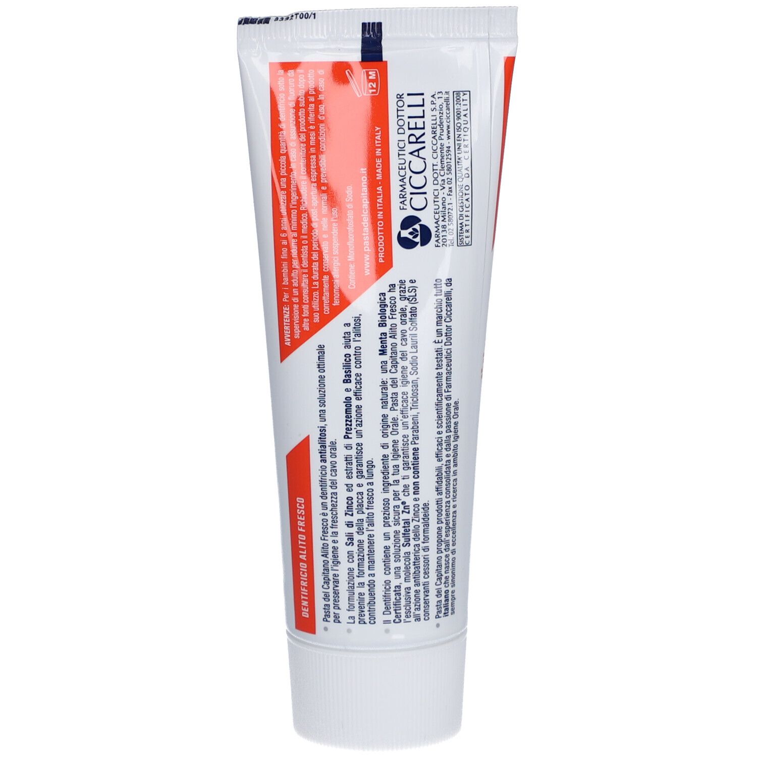 Dos d'un tube de dentifrice. Informations textuelles et logo Ciccarelli. Tube blanc avec texte rouge et bleu.