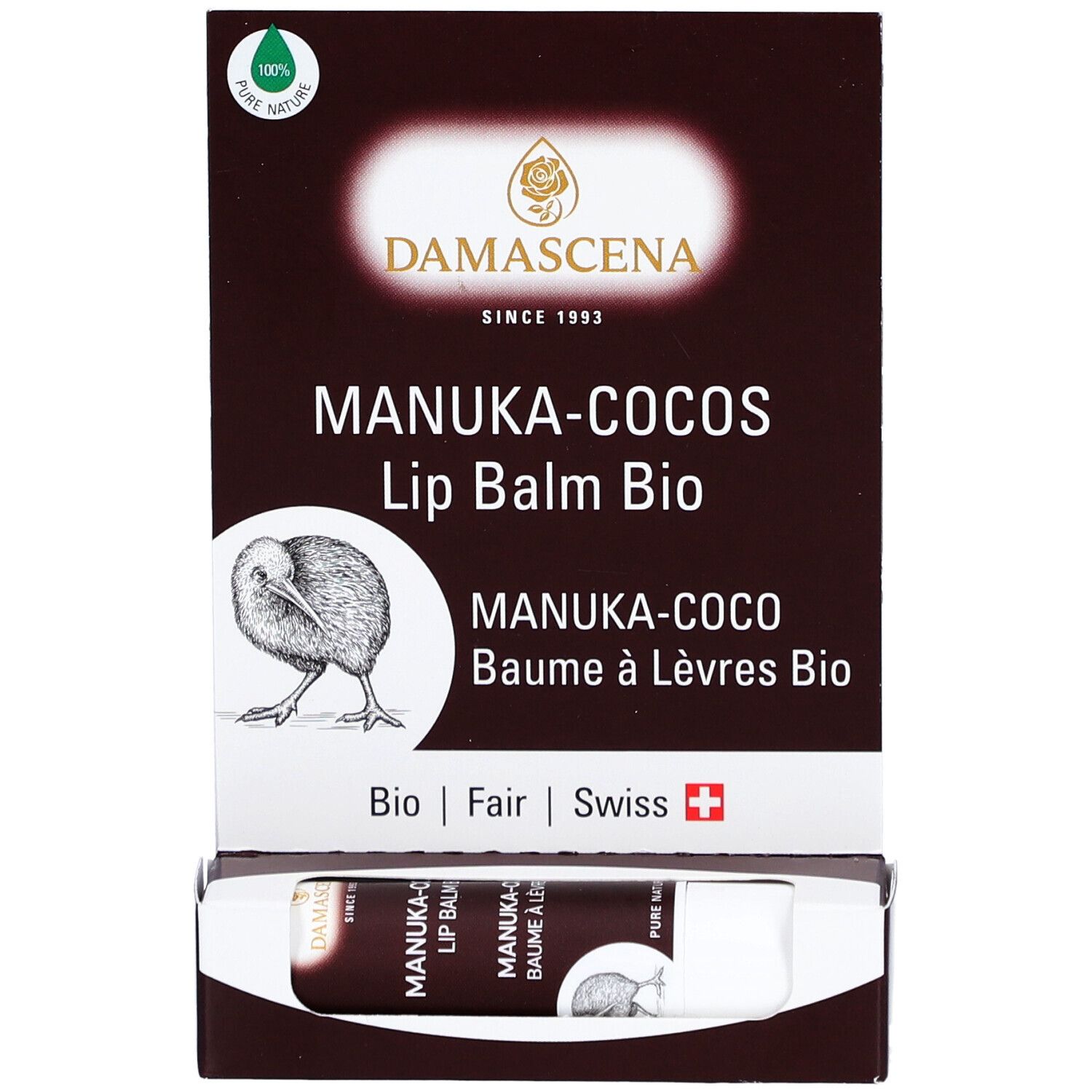 Présentoir avec baume à lèvres. Nom: MANUKA-COCOS Lip Balm Bio. Logo: Kiwi. Emballage avec informations.
