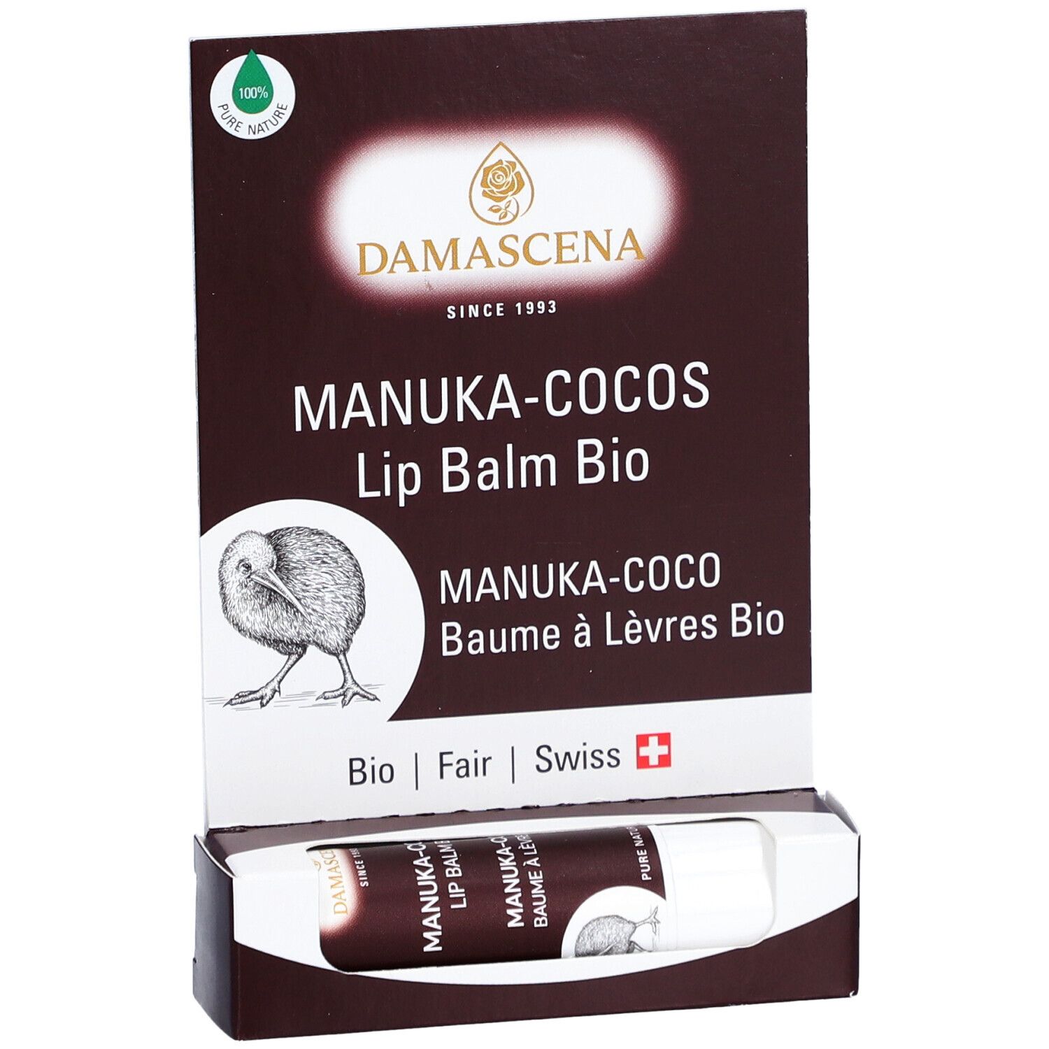 Présentoir avec baume à lèvres. Nom: MANUKA-COCOS Lip Balm Bio. Logo: Kiwi. Emballage avec informations.