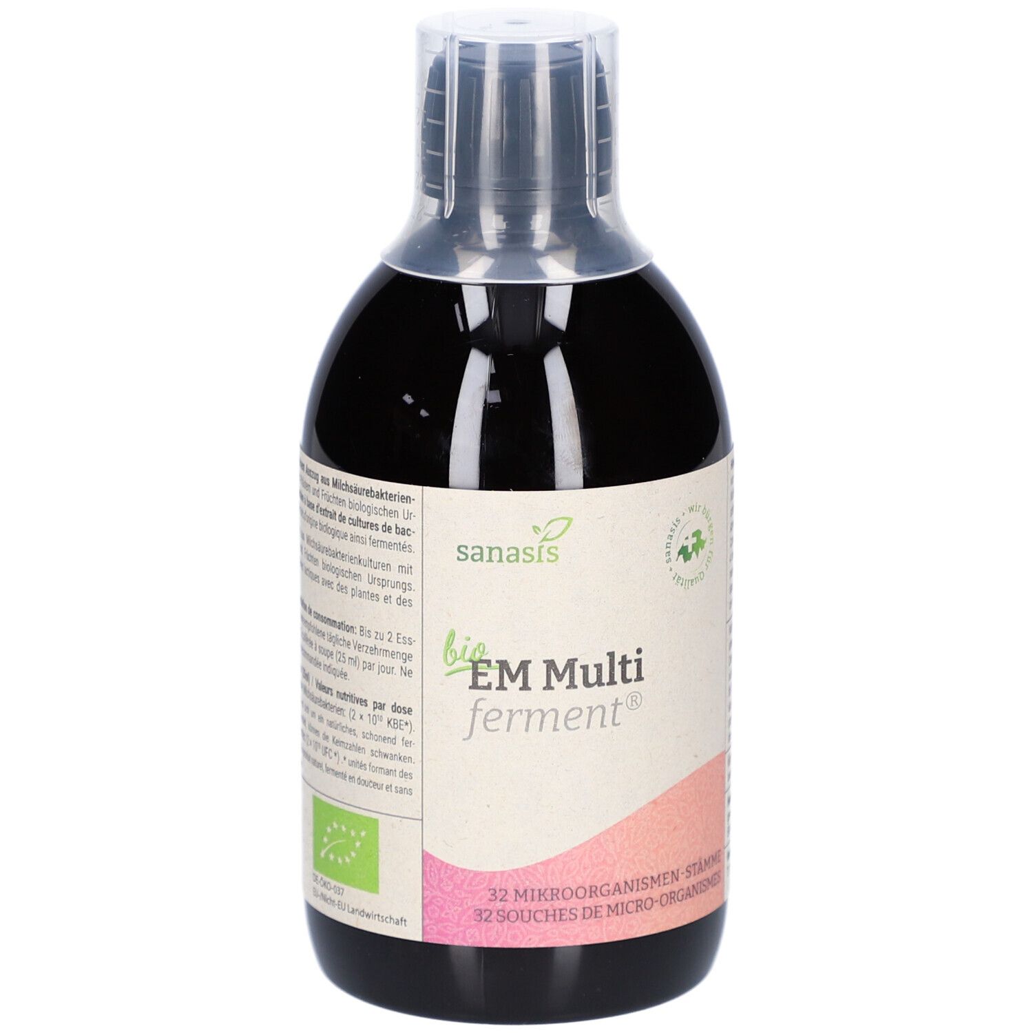 Liquide brun en bouteille avec étiquette. Inscription: bio EM Multi ferment. Avec label bio.