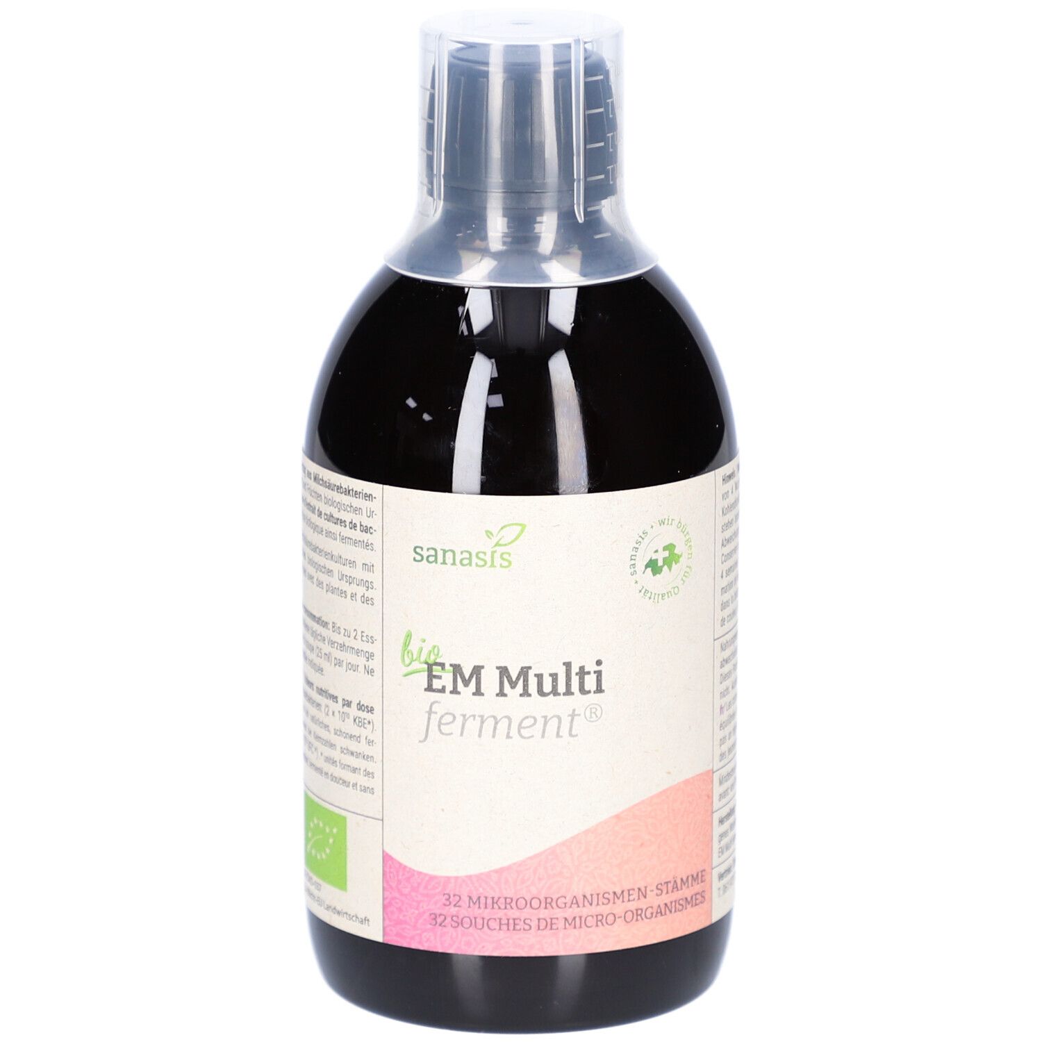 Liquide brun en bouteille avec étiquette. Inscription: bio EM Multi ferment. Avec label bio.