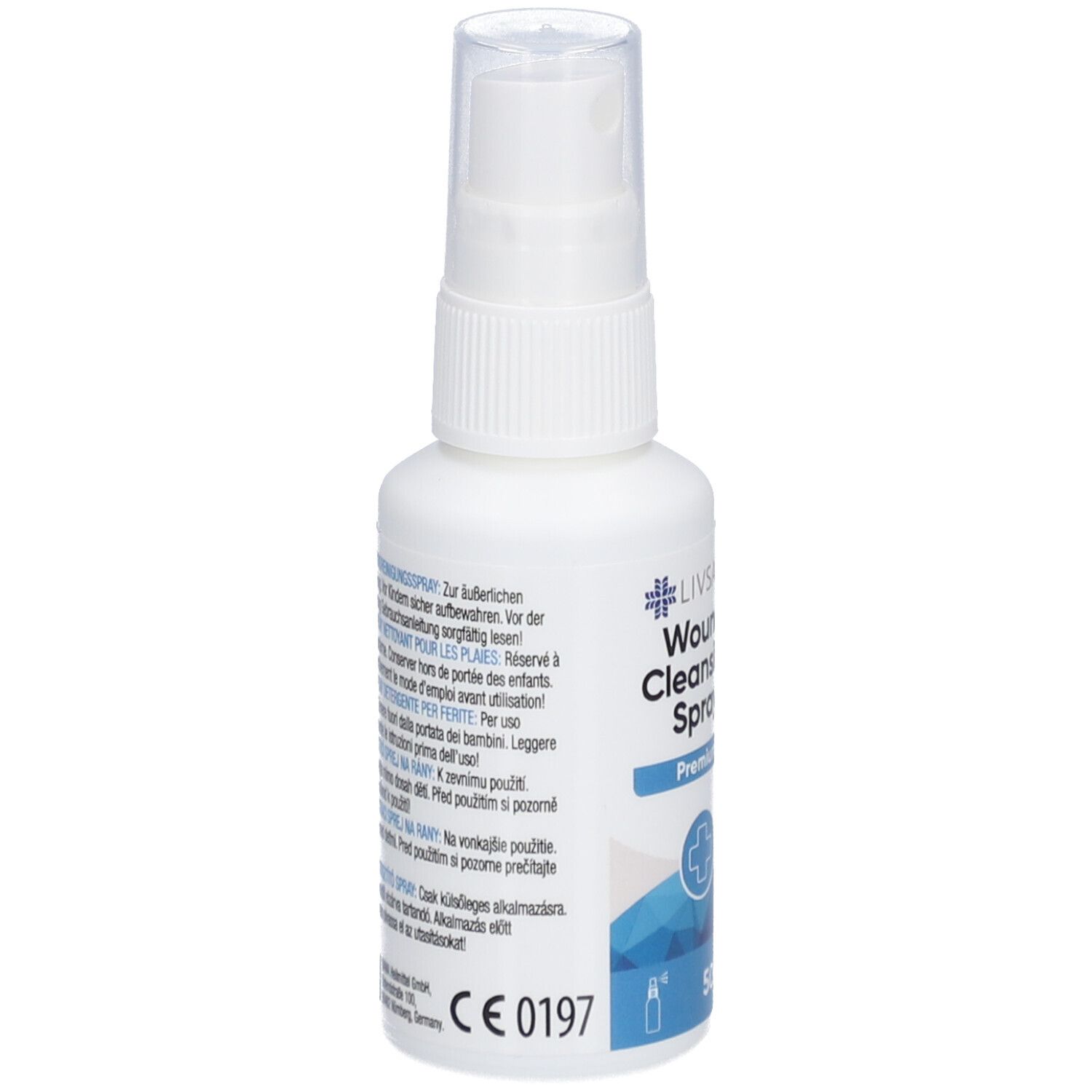Flacon pulvérisateur blanc avec étiquette bleue. Texte: Livsane Wund Cleansing Spray Premium. Marquage CE.