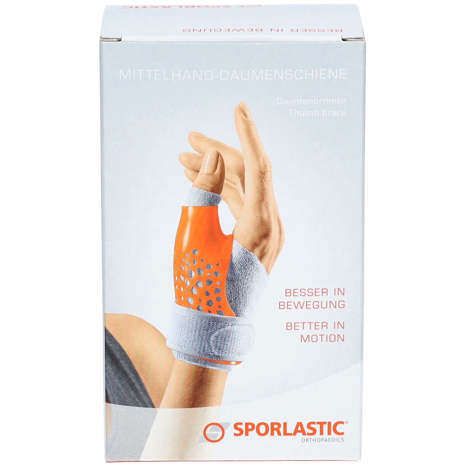 Boîte de l'attelle de pouce. Attelle orange et grise sur une main. Marque : SPORLASTIC.