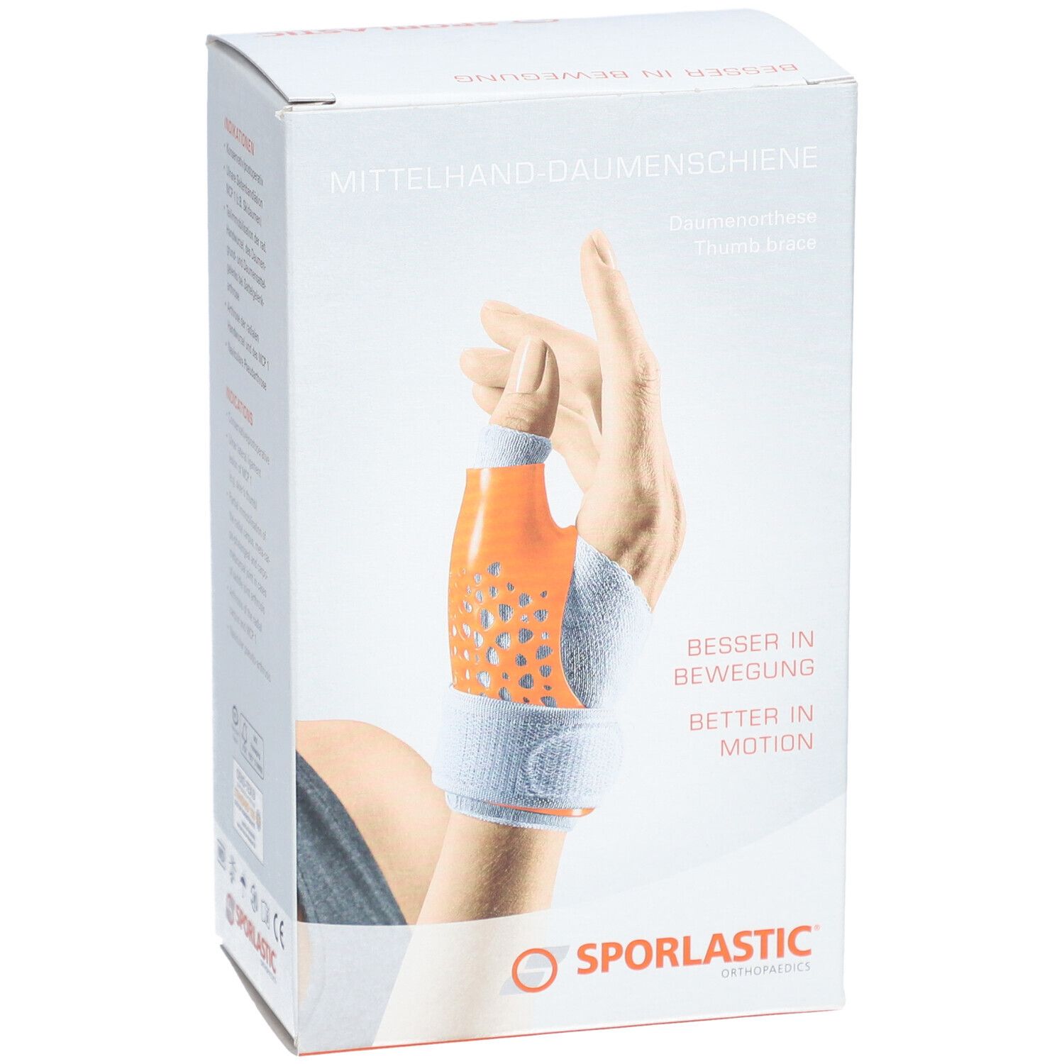 Boîte de l'attelle de pouce. Produit orange et blanc. Marque SPORLASTIC. Texte: Besser in Bewegung.