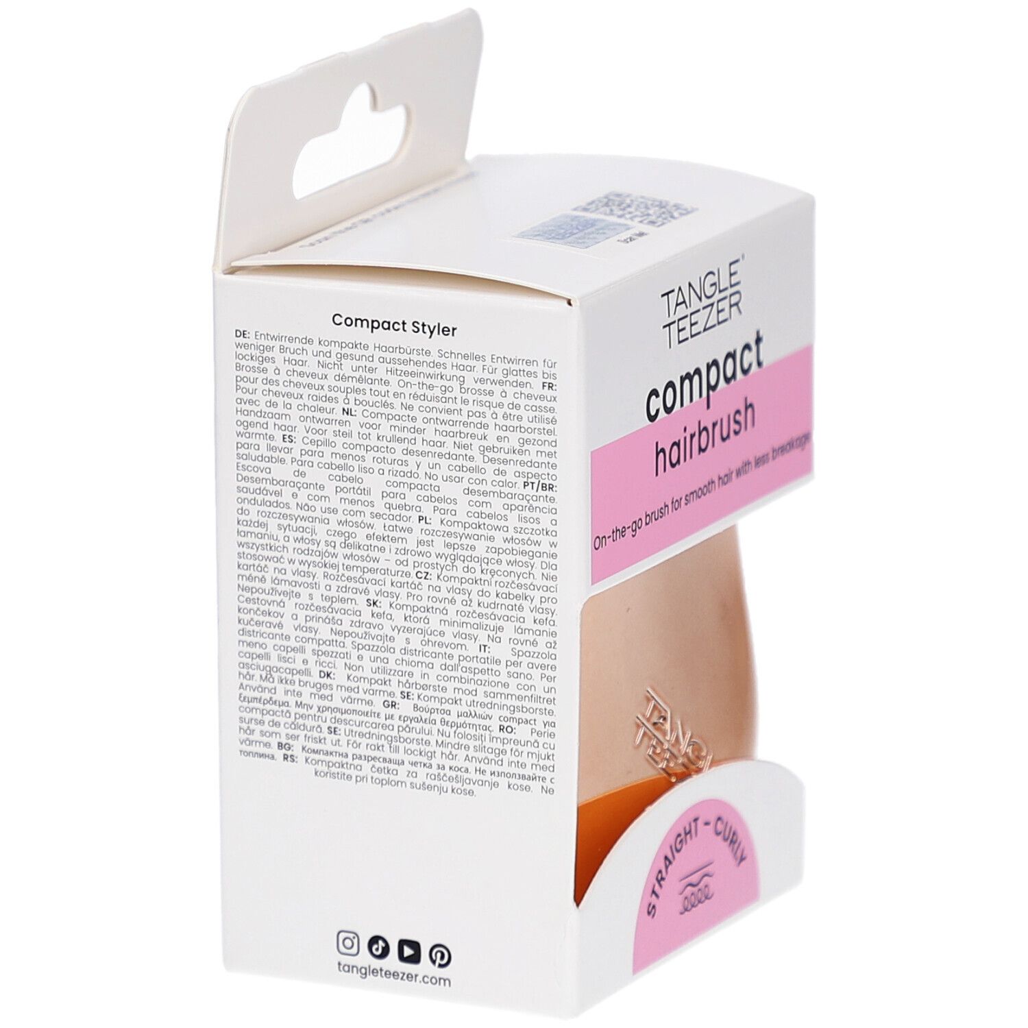 Emballage de la brosse à cheveux compacte. Marque TANGLE TEEZER. Texte multilingue. Informations produit au dos.