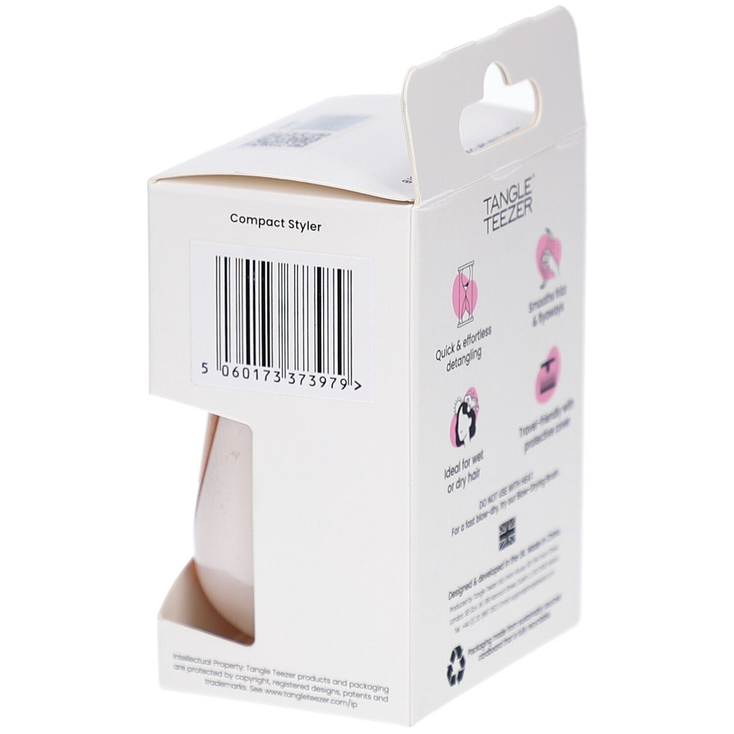 Emballage de la brosse à cheveux compacte. Marque TANGLE TEEZER. Code-barres et caractéristiques du produit au dos.