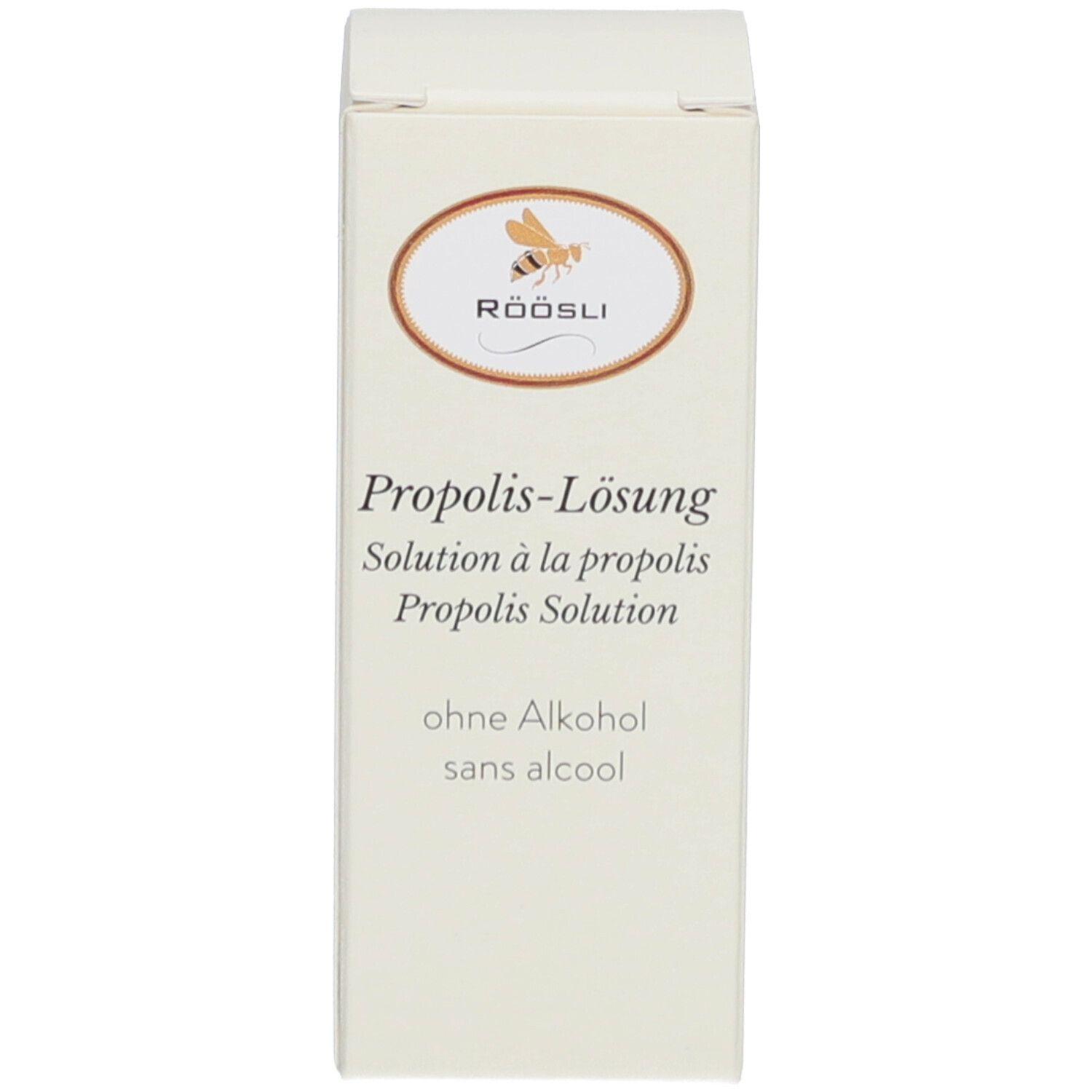 Boîte avec nom du produit, marque RÖÖSLI et sans alcool. Solution.