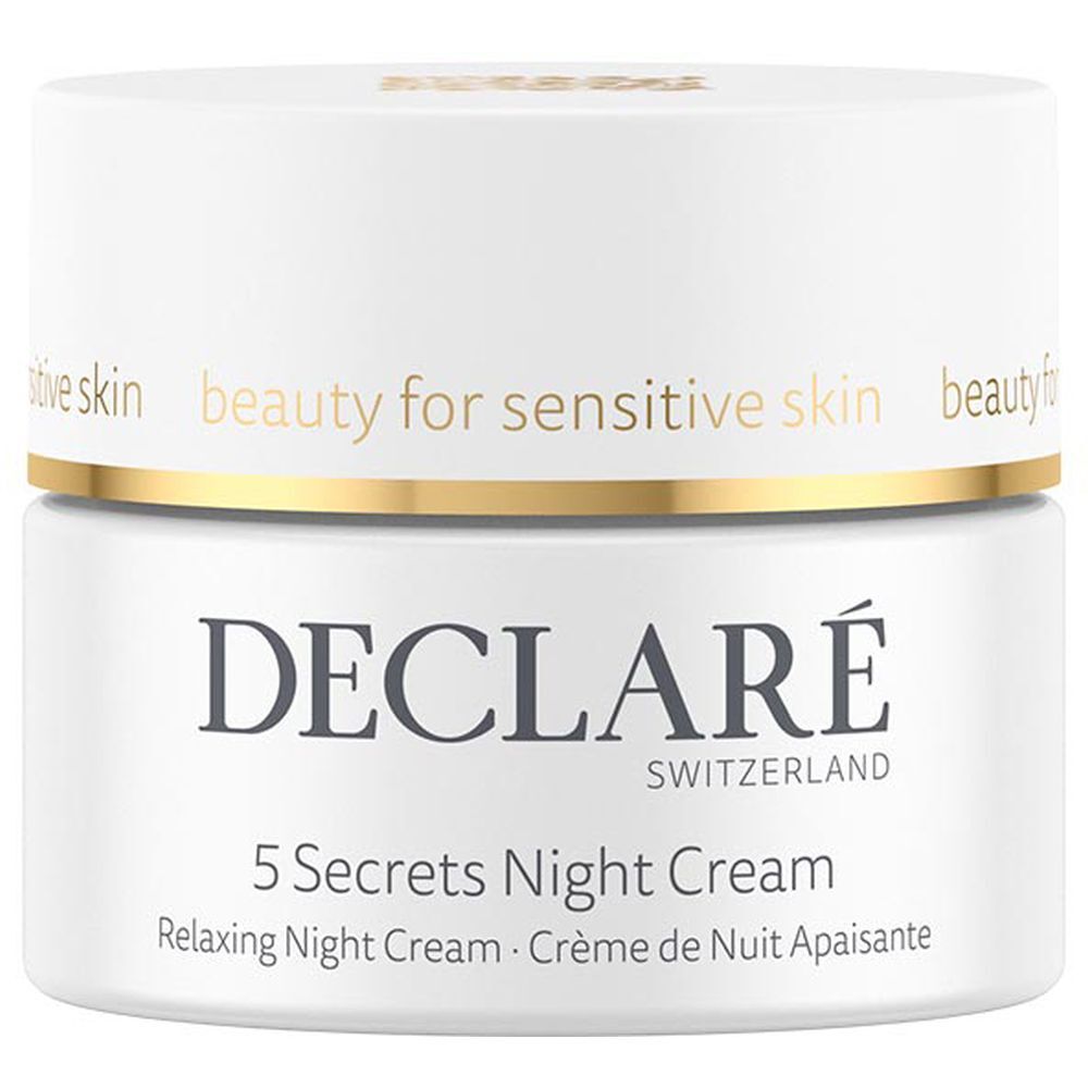 Pot blanc avec bord doré. DECLARÉ 5 Secrets Night Cream. Texte: Relaxing Night Cream.