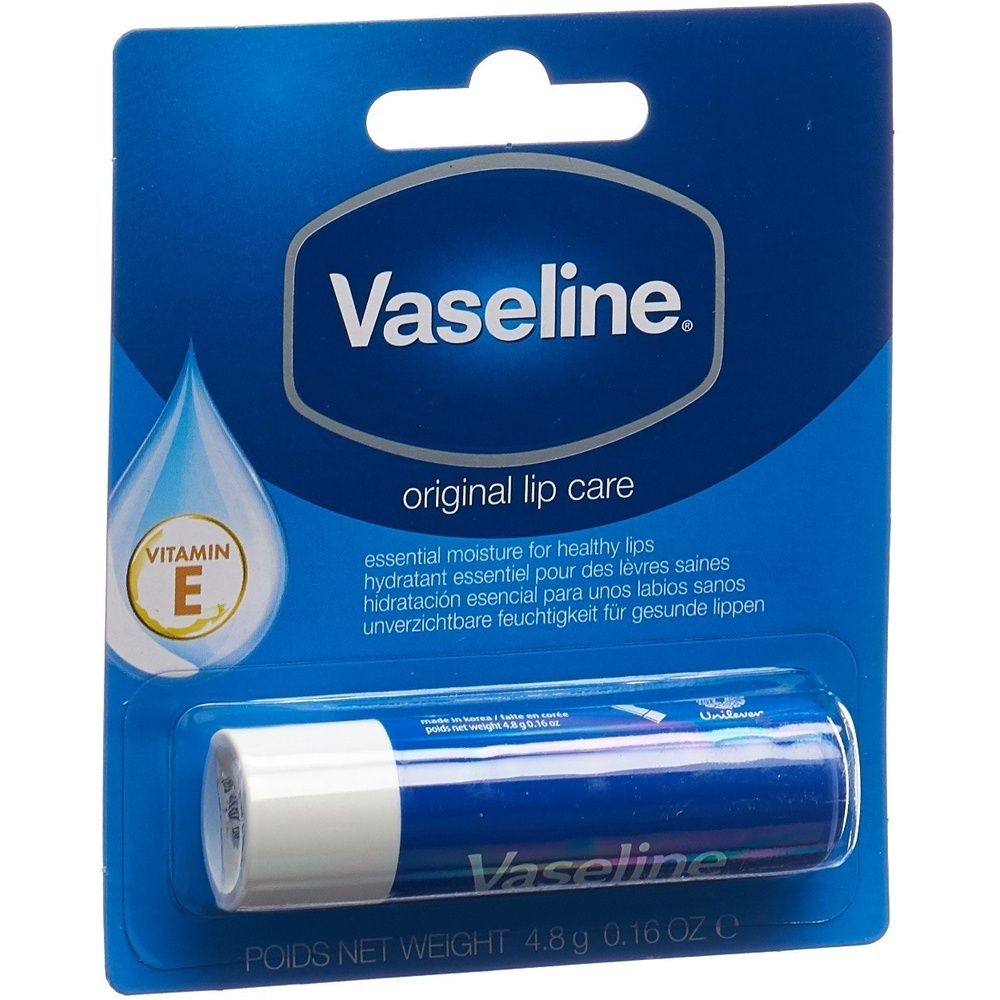 Stick de soin des lèvres Vaseline Original dans un emballage blister bleu. Nom du produit et symbole de goutte visibles. Baume à lèvres visible.
