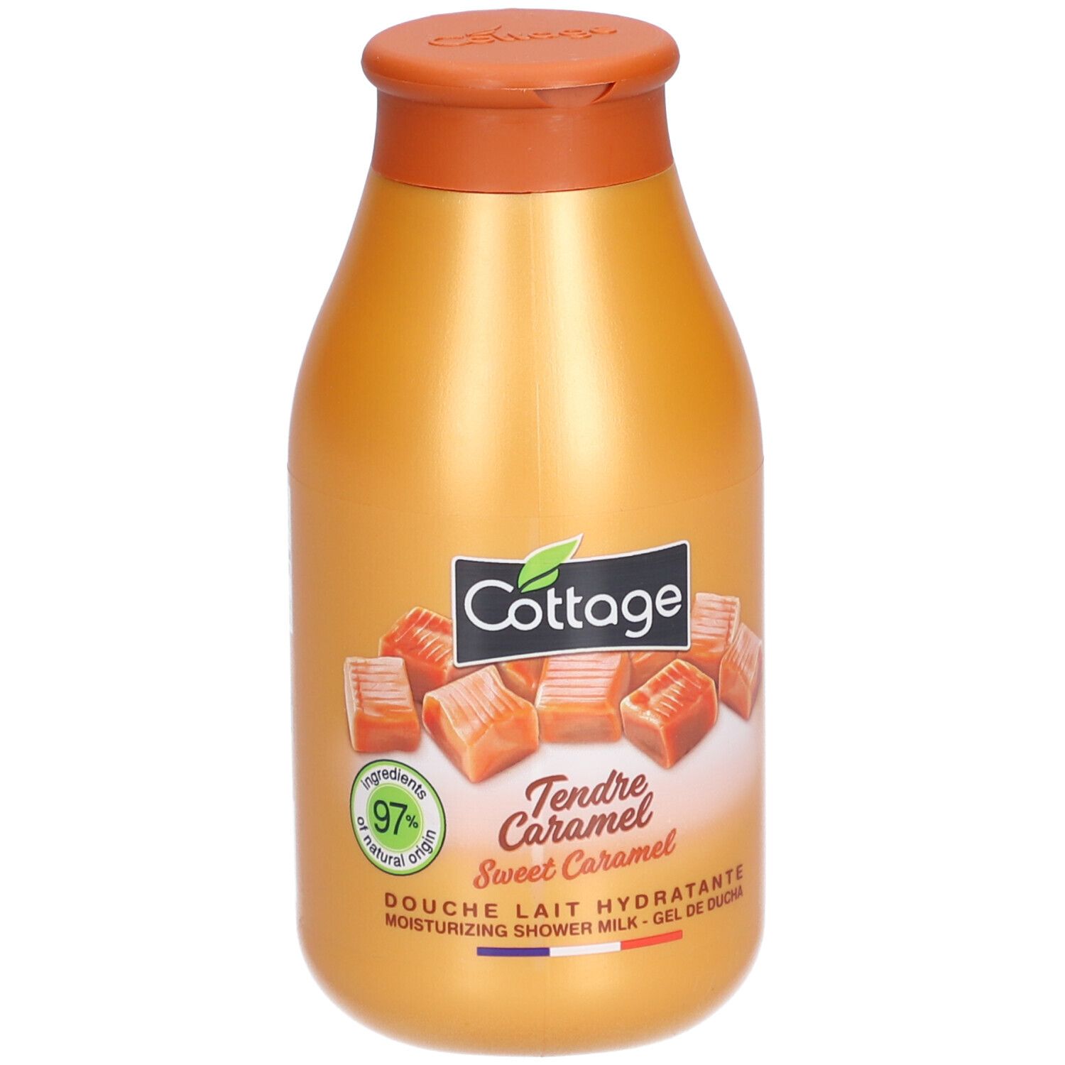 Flacon doré avec bouchon marron. Inscription: Cottage, Tendre Caramel, 97% d'origine naturelle. Illustration de bonbons au caramel.